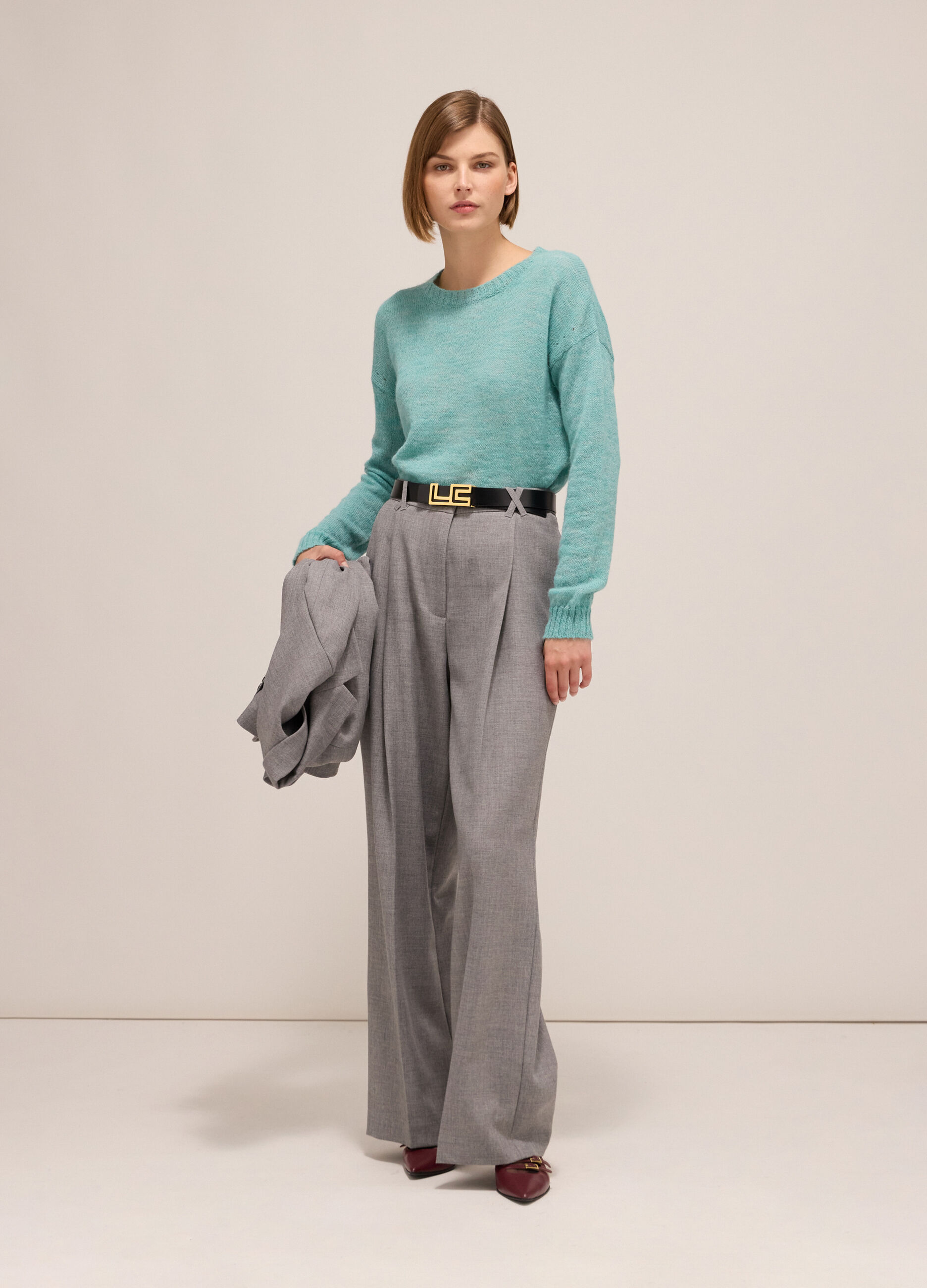 Knitted sweater with round neck