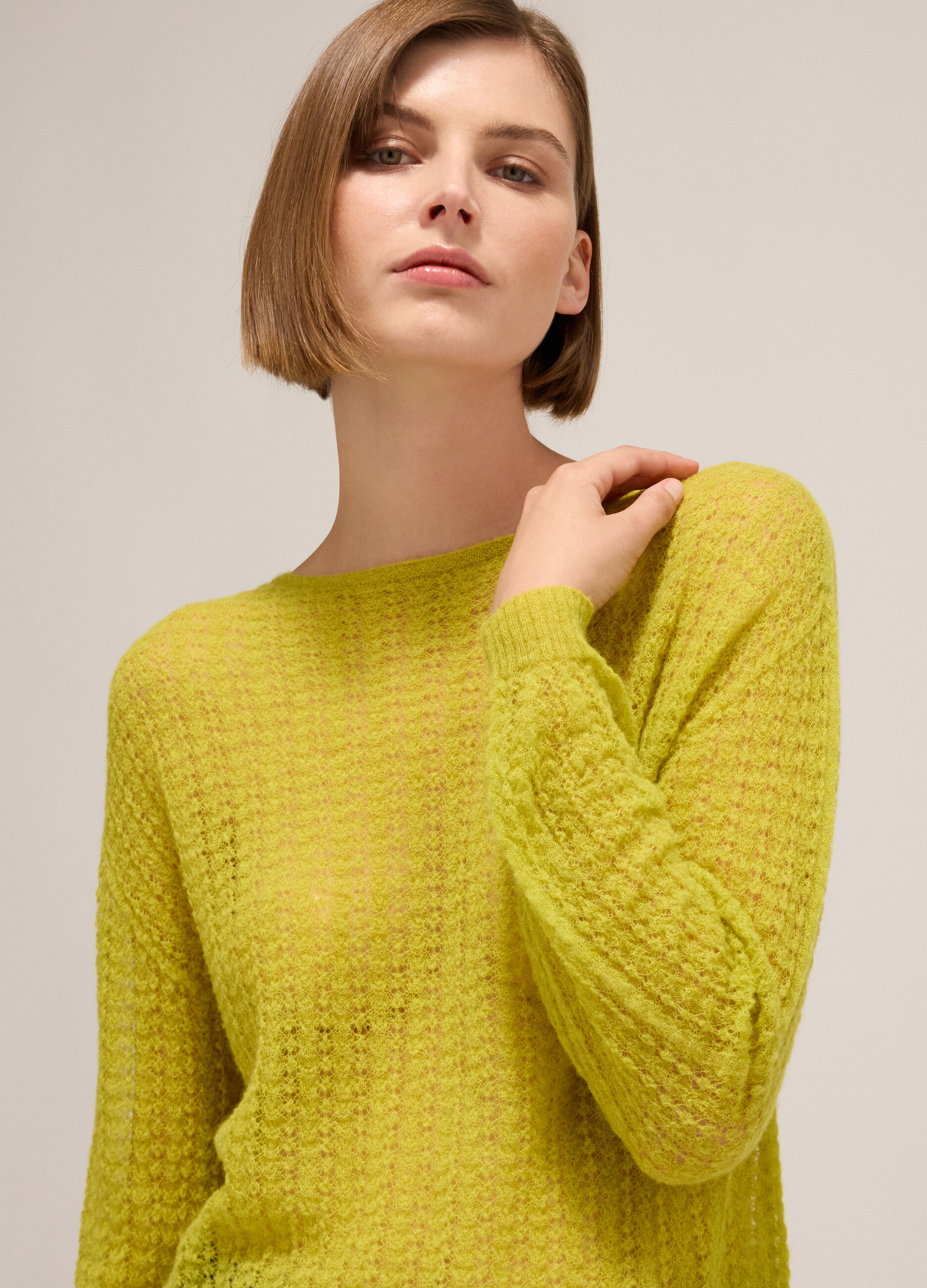 Knitted sweater with long sleeves