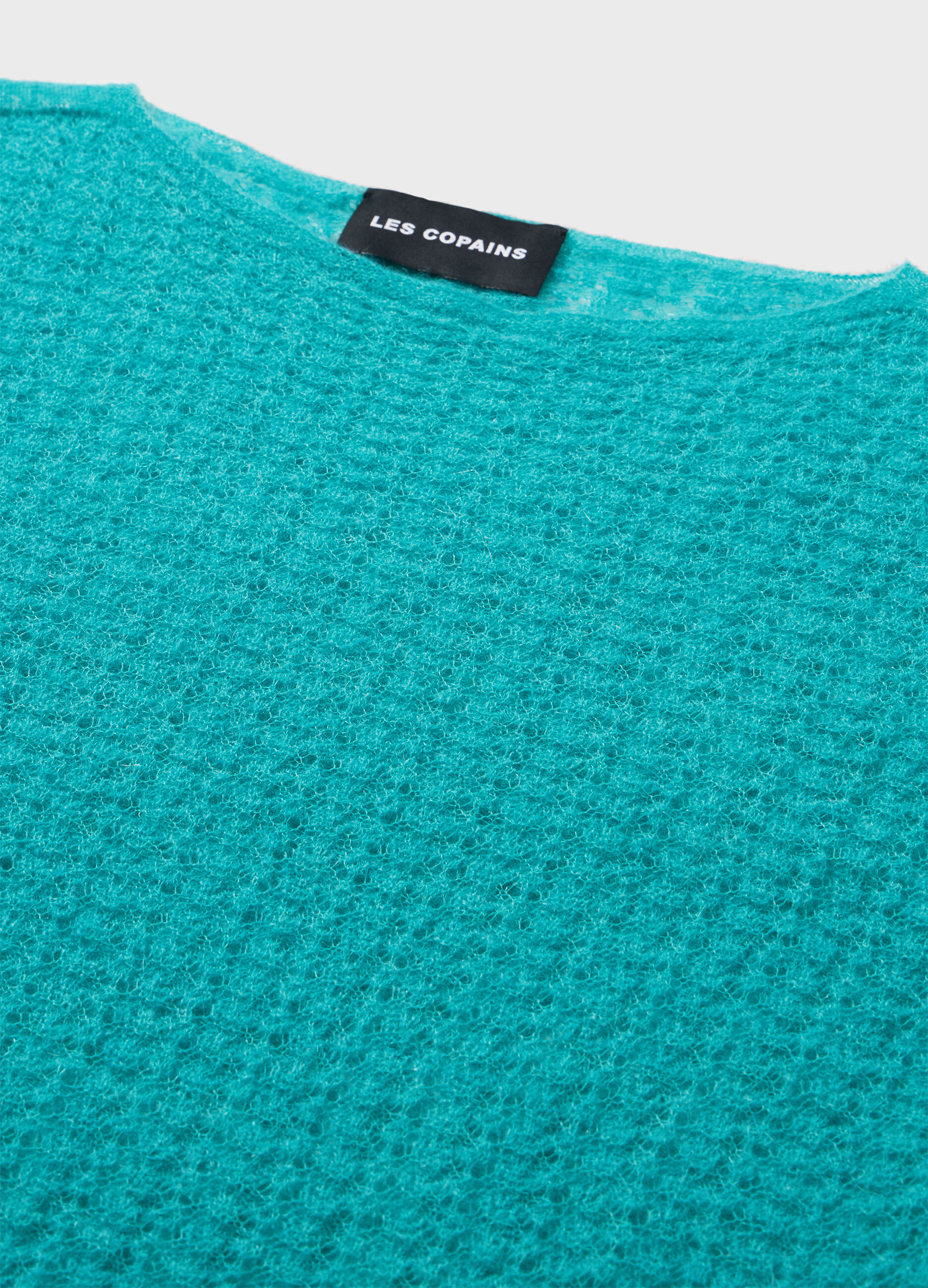 Knitted sweater with long sleeves