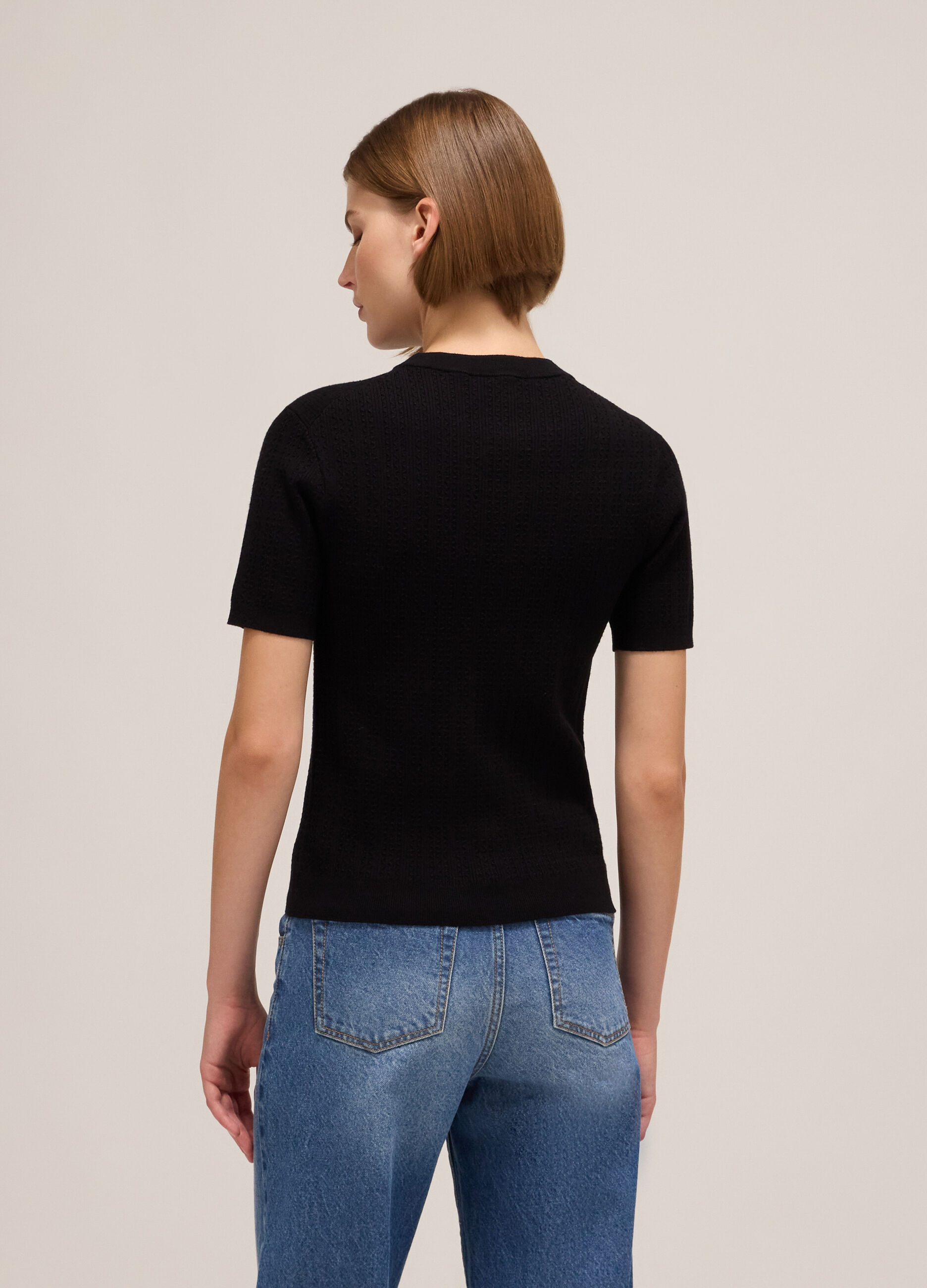 Knitted top with short sleeves