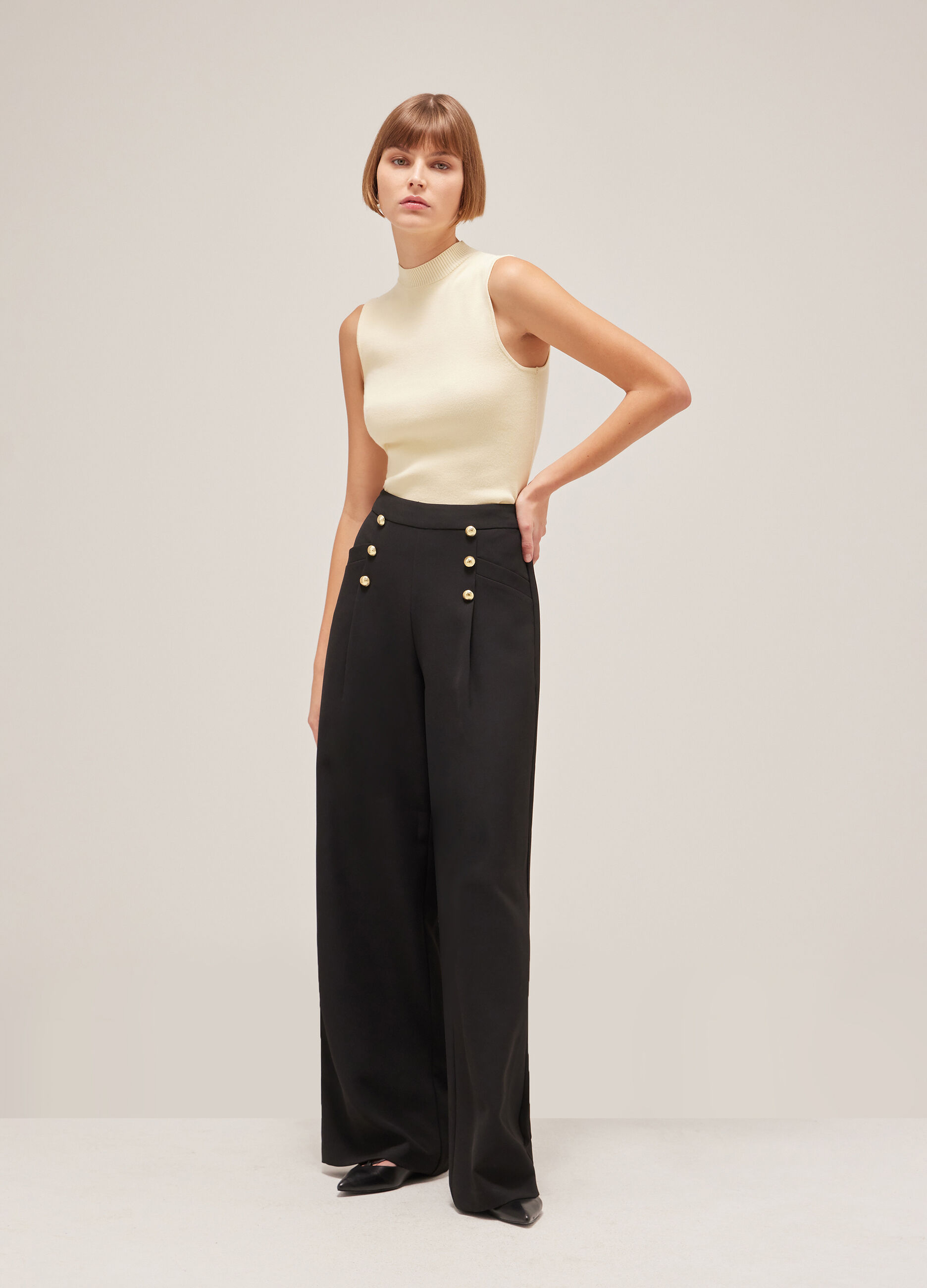 Palazzo trousers with side buttons