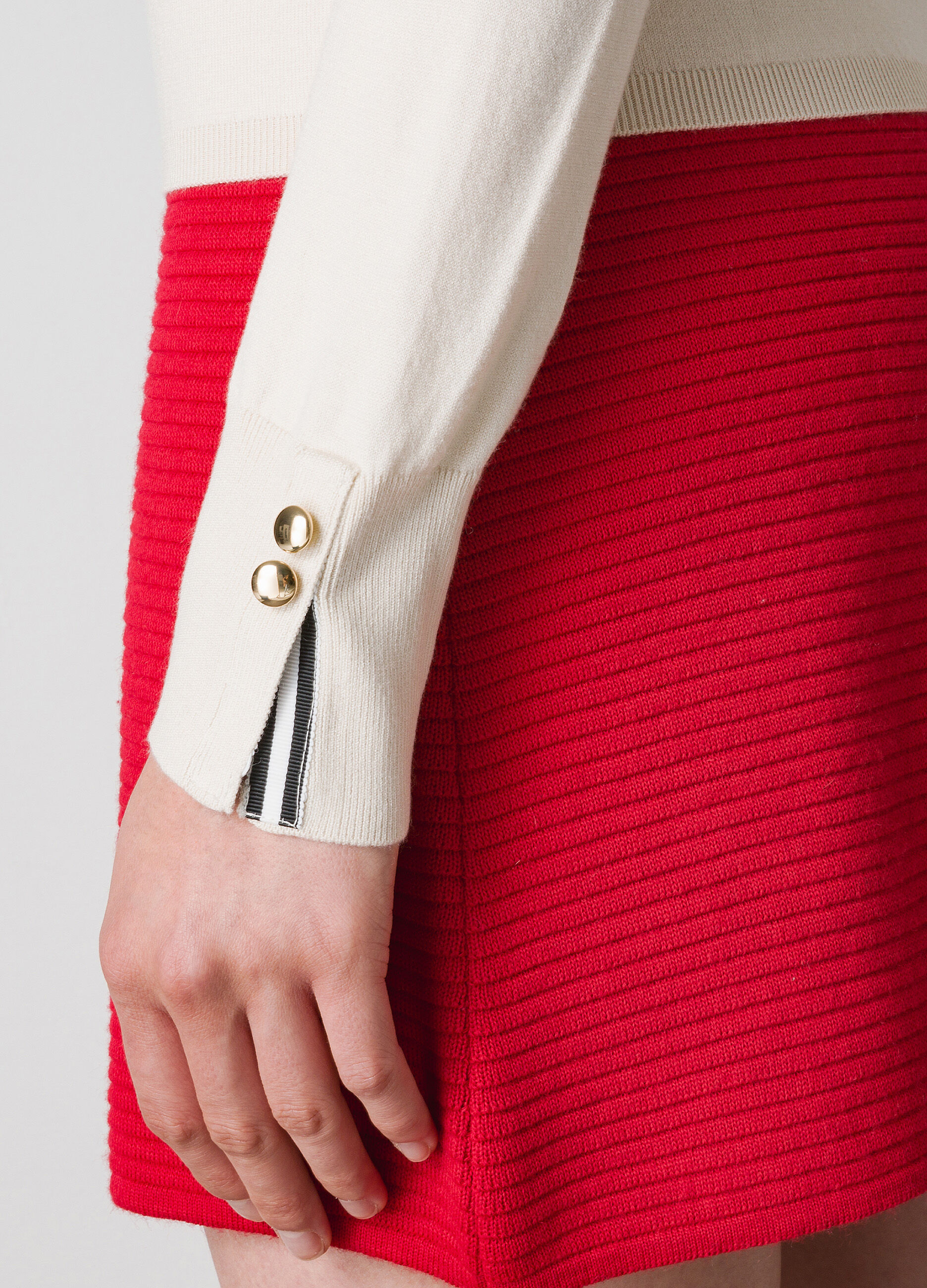 Tricot turtleneck with buttons