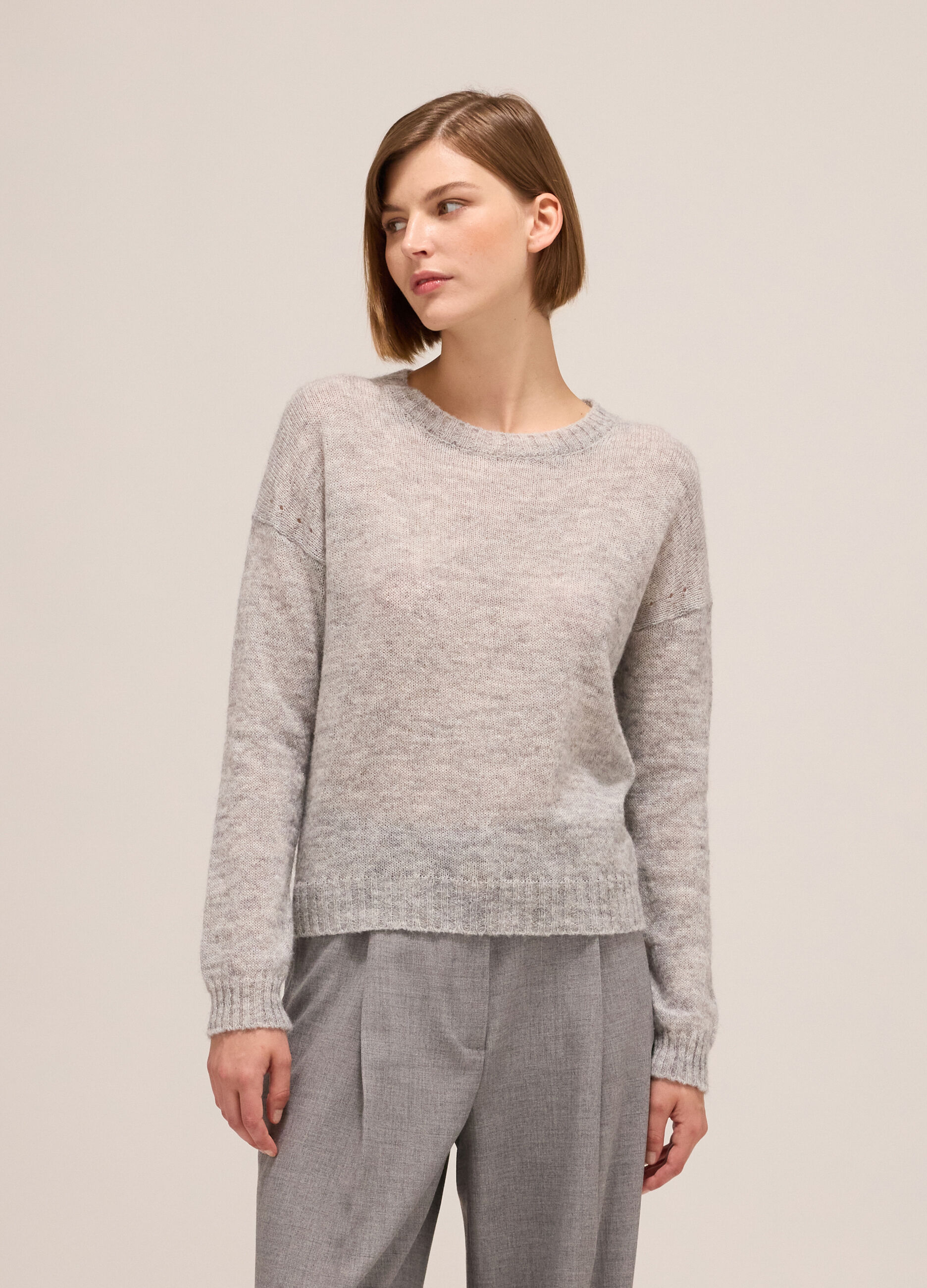Knitted sweater with round neck