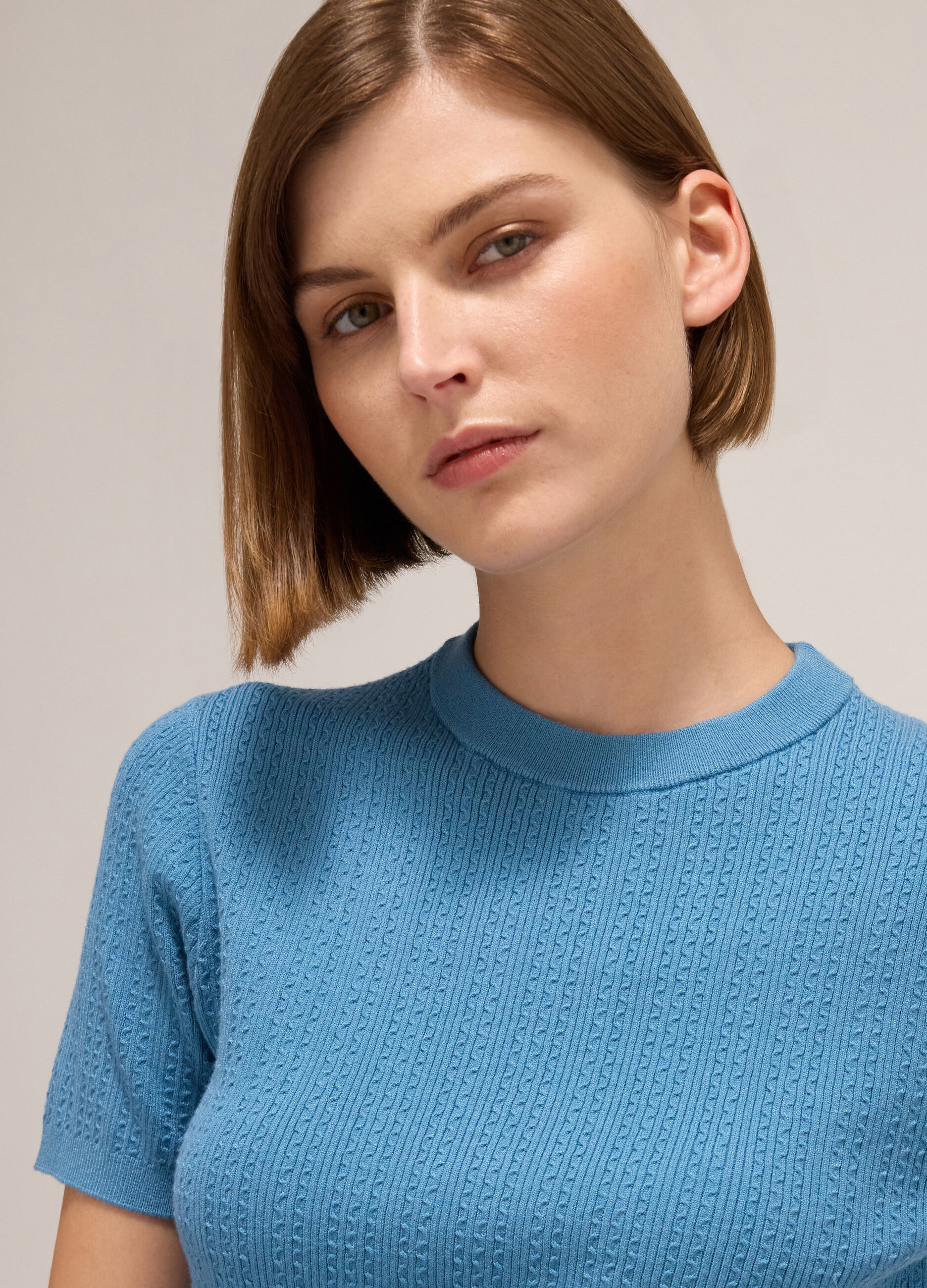 Knitted top with short sleeves
