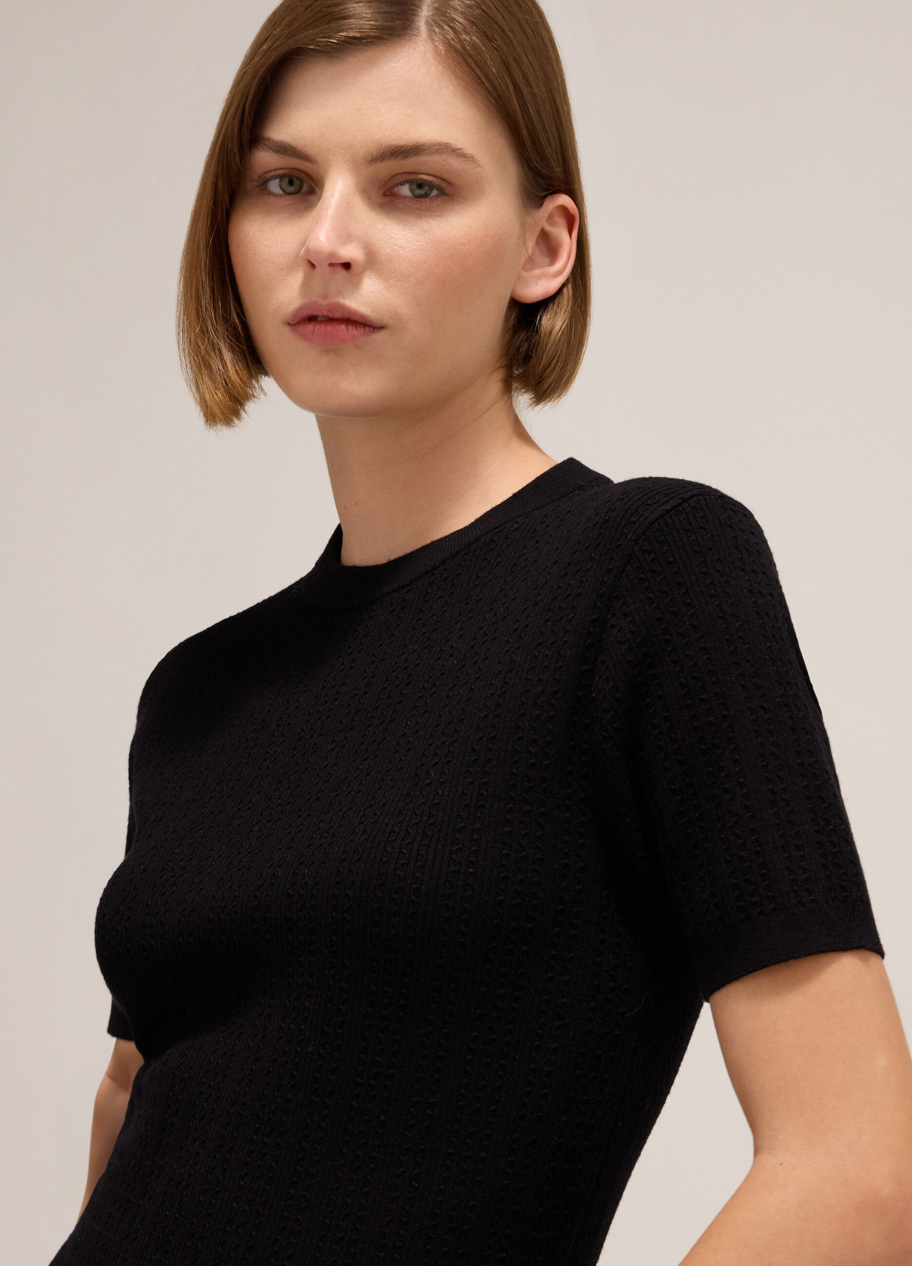 Knitted top with short sleeves