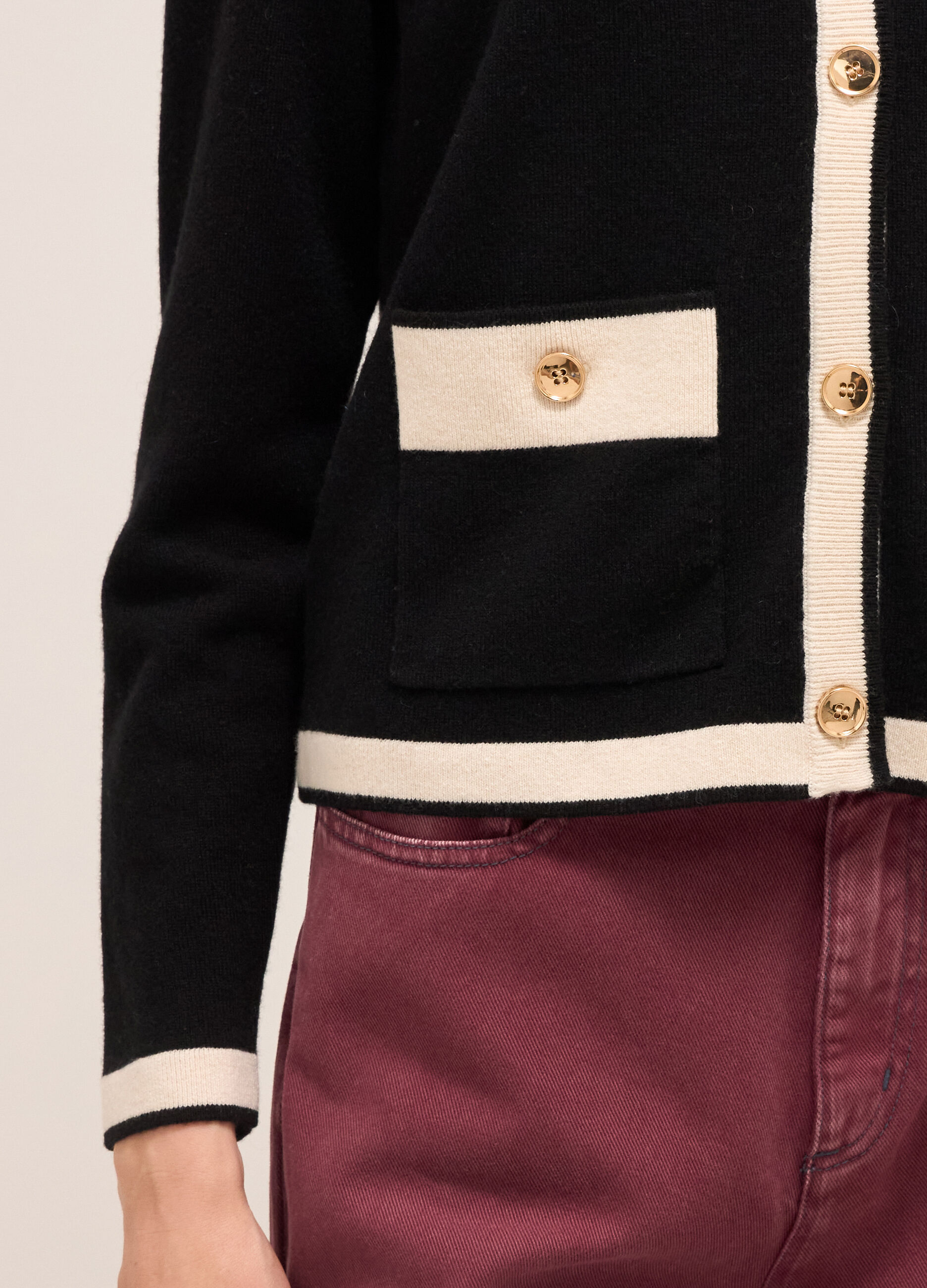 Knitted cardigan with contrasting coloured trims