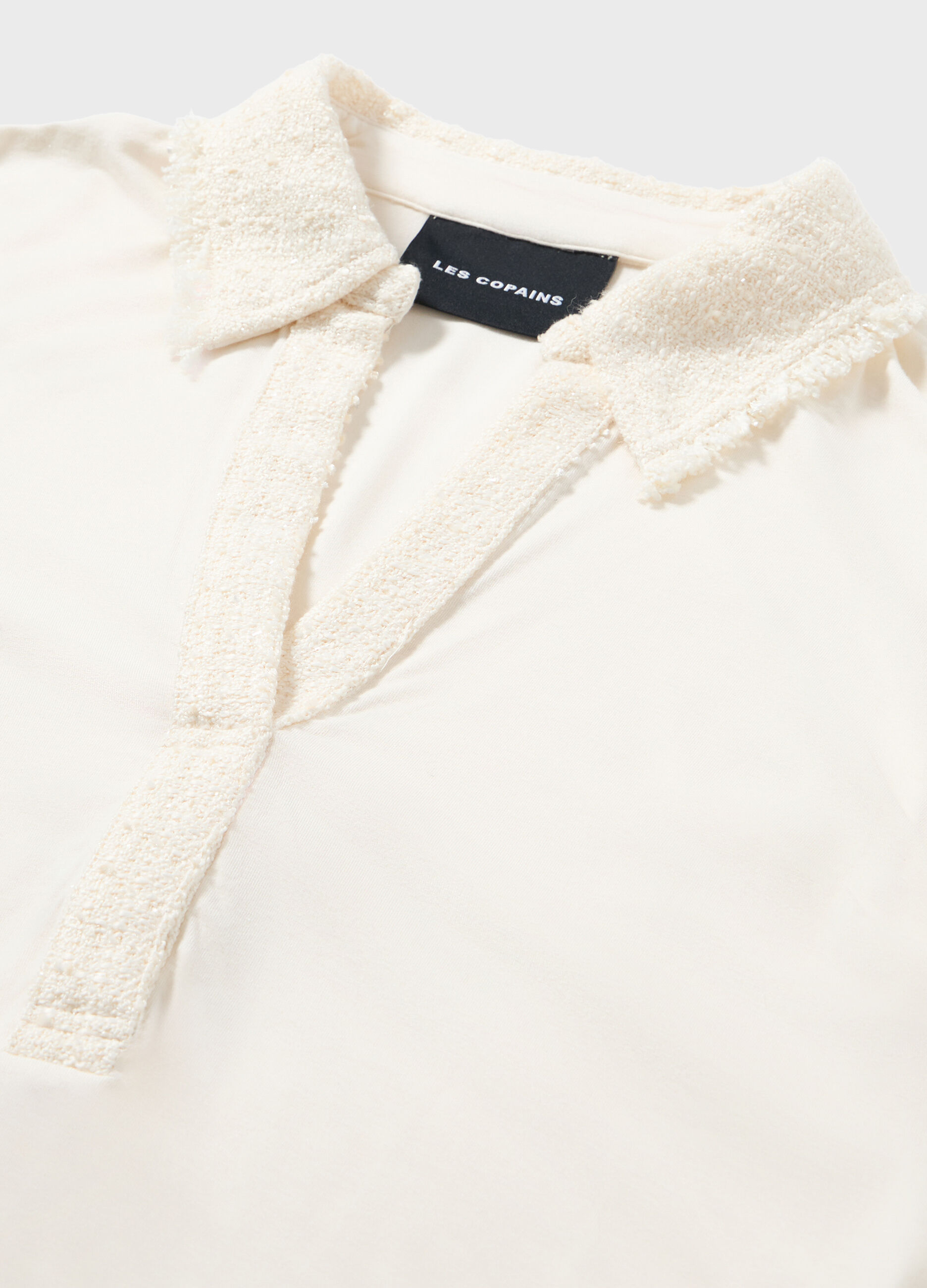Polo shirt with long sleeves and bouclé inserts