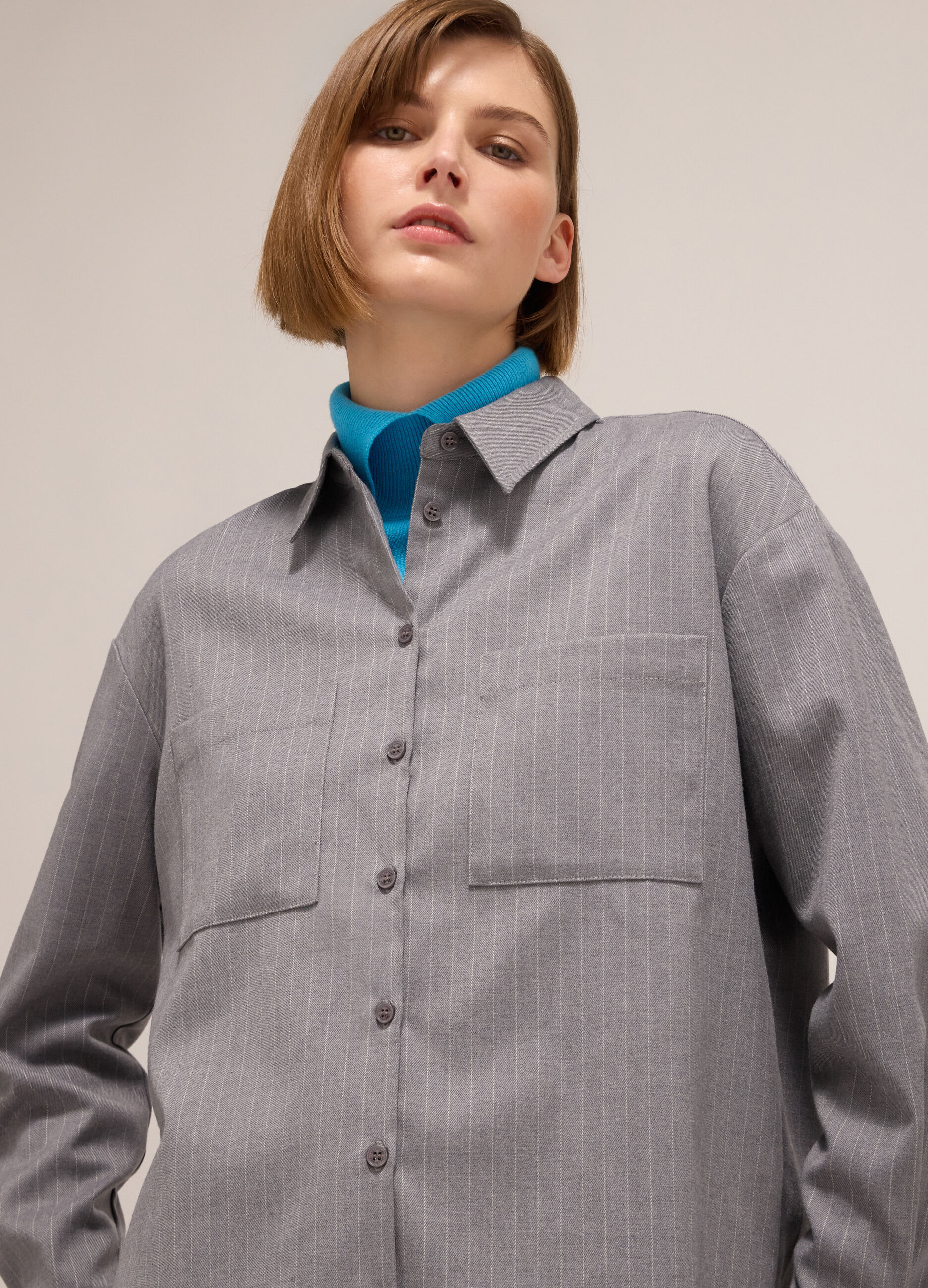 Pinstriped shirt with long sleeves