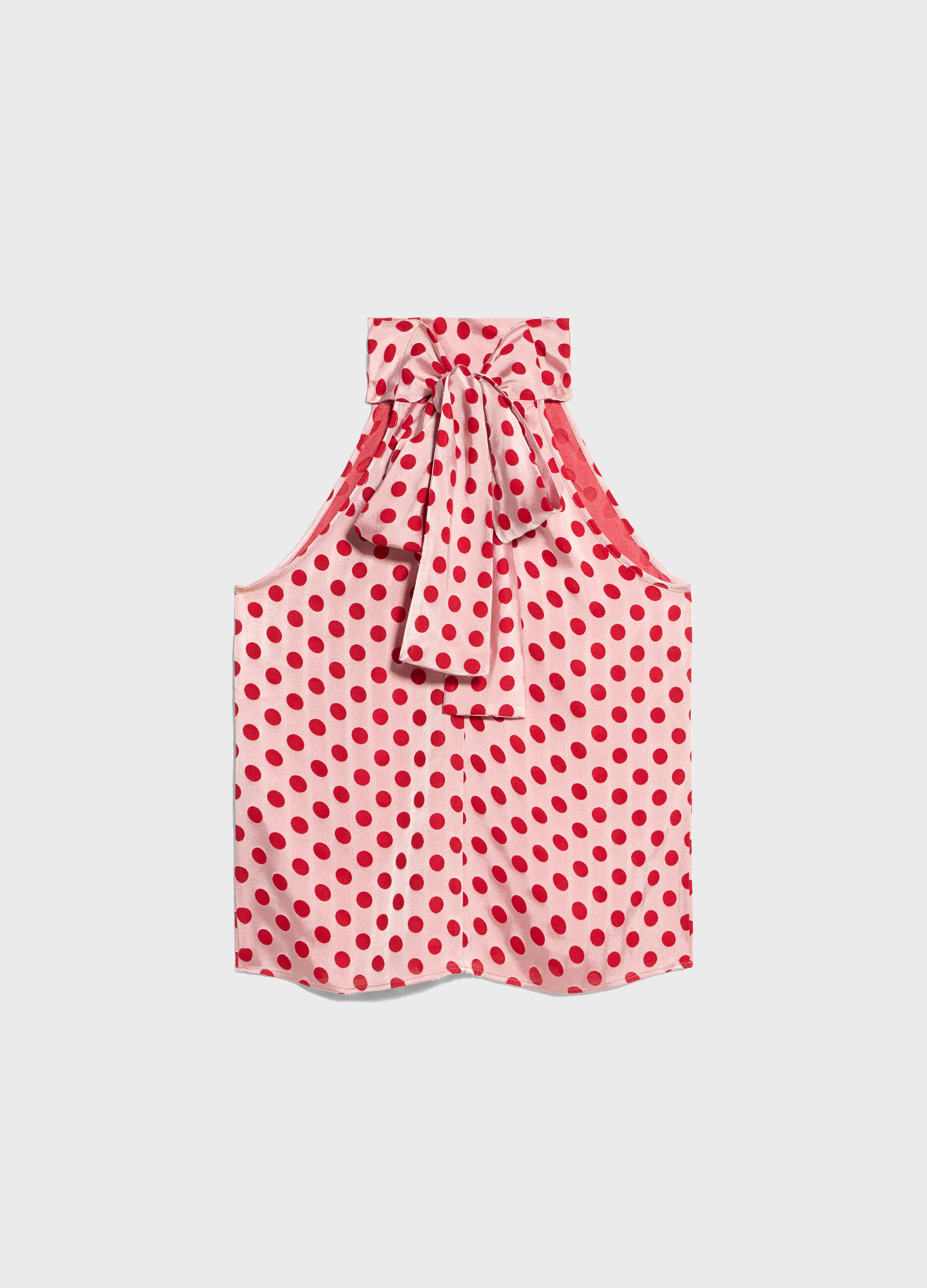 Polka dot top with bow