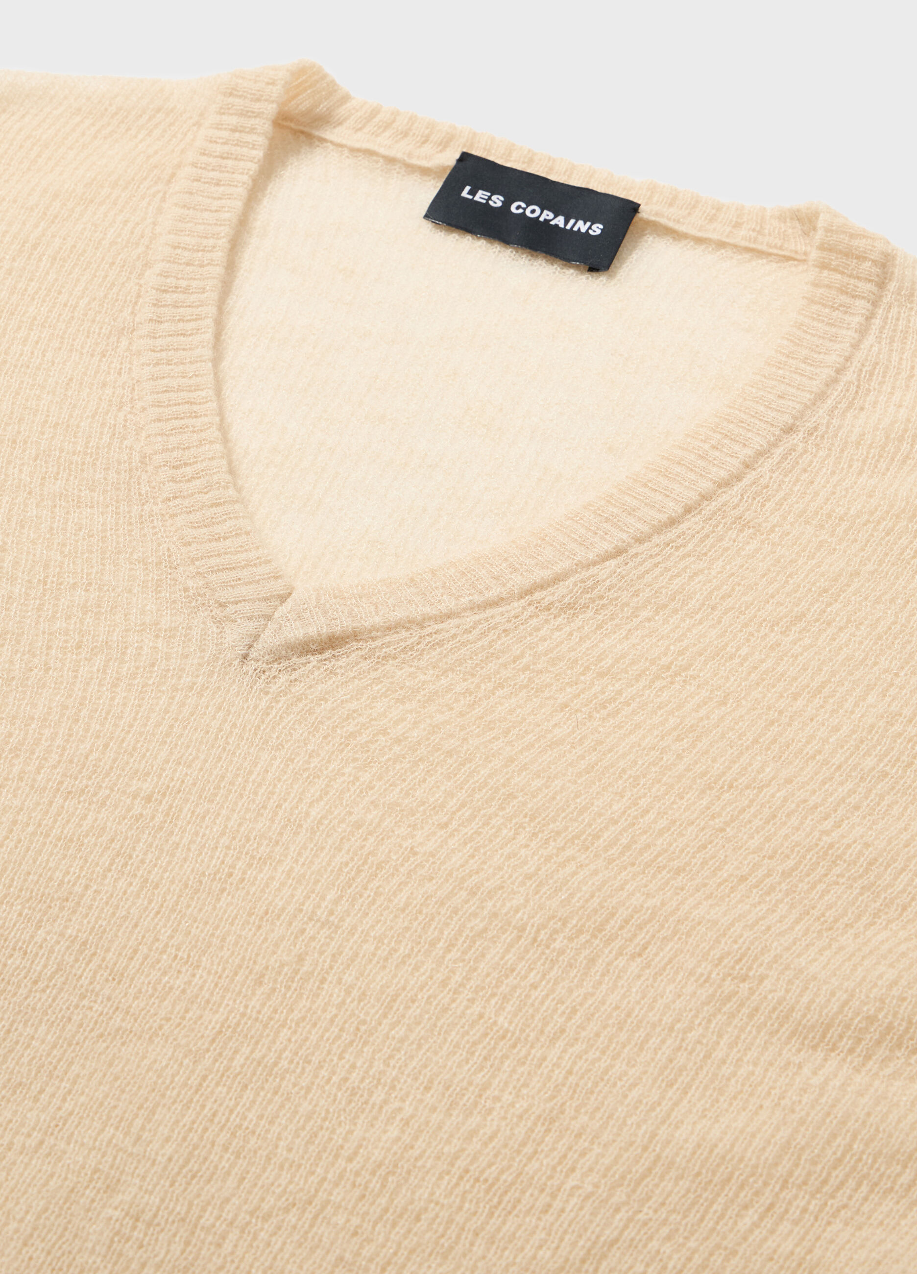 Knitted sweater with V neck