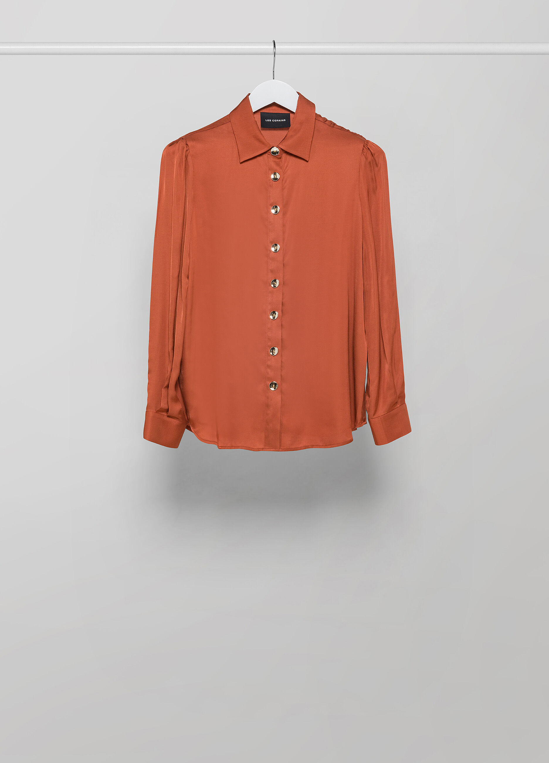 Gathered long-sleeved shirt