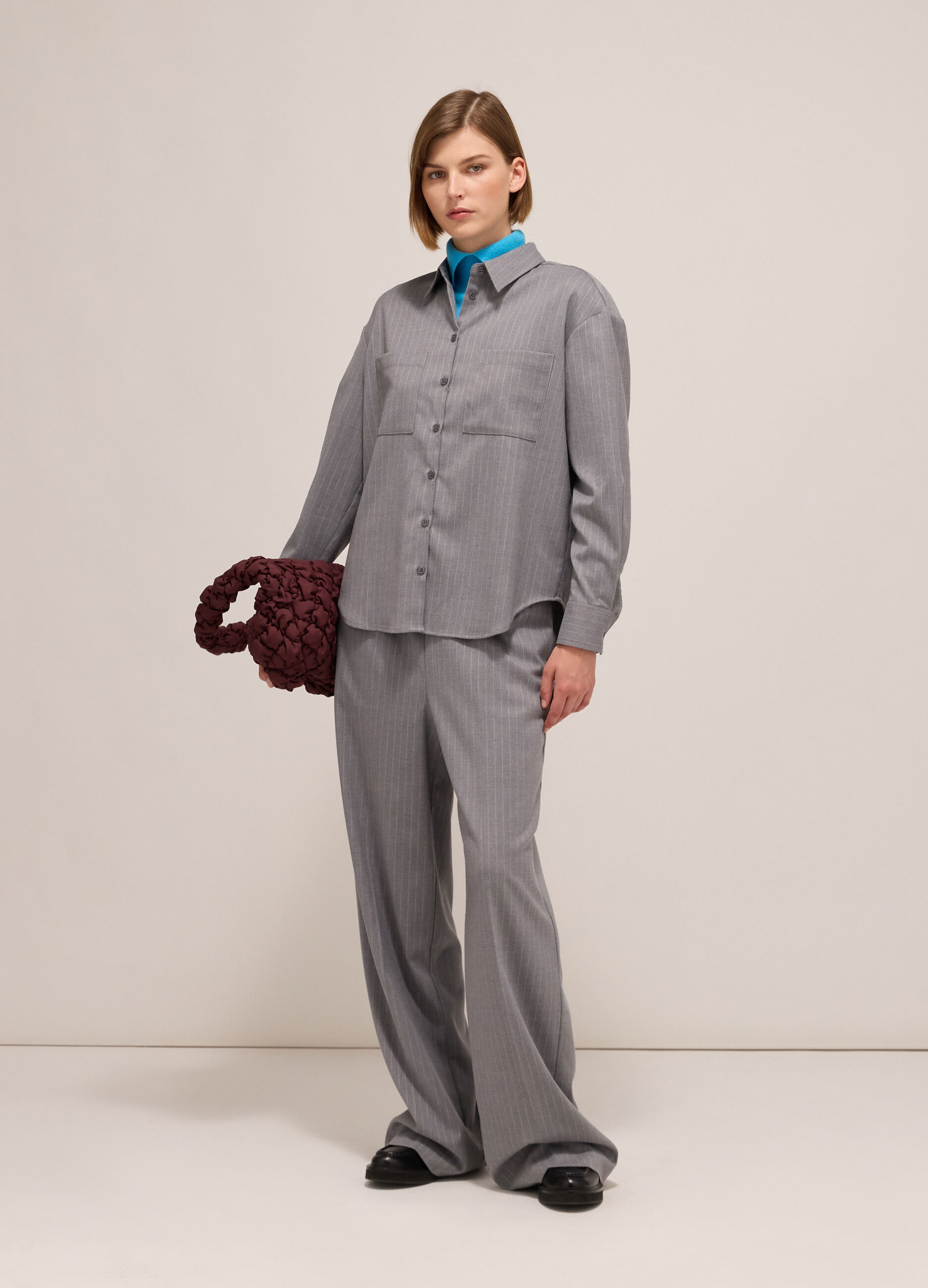 Pinstriped shirt with long sleeves