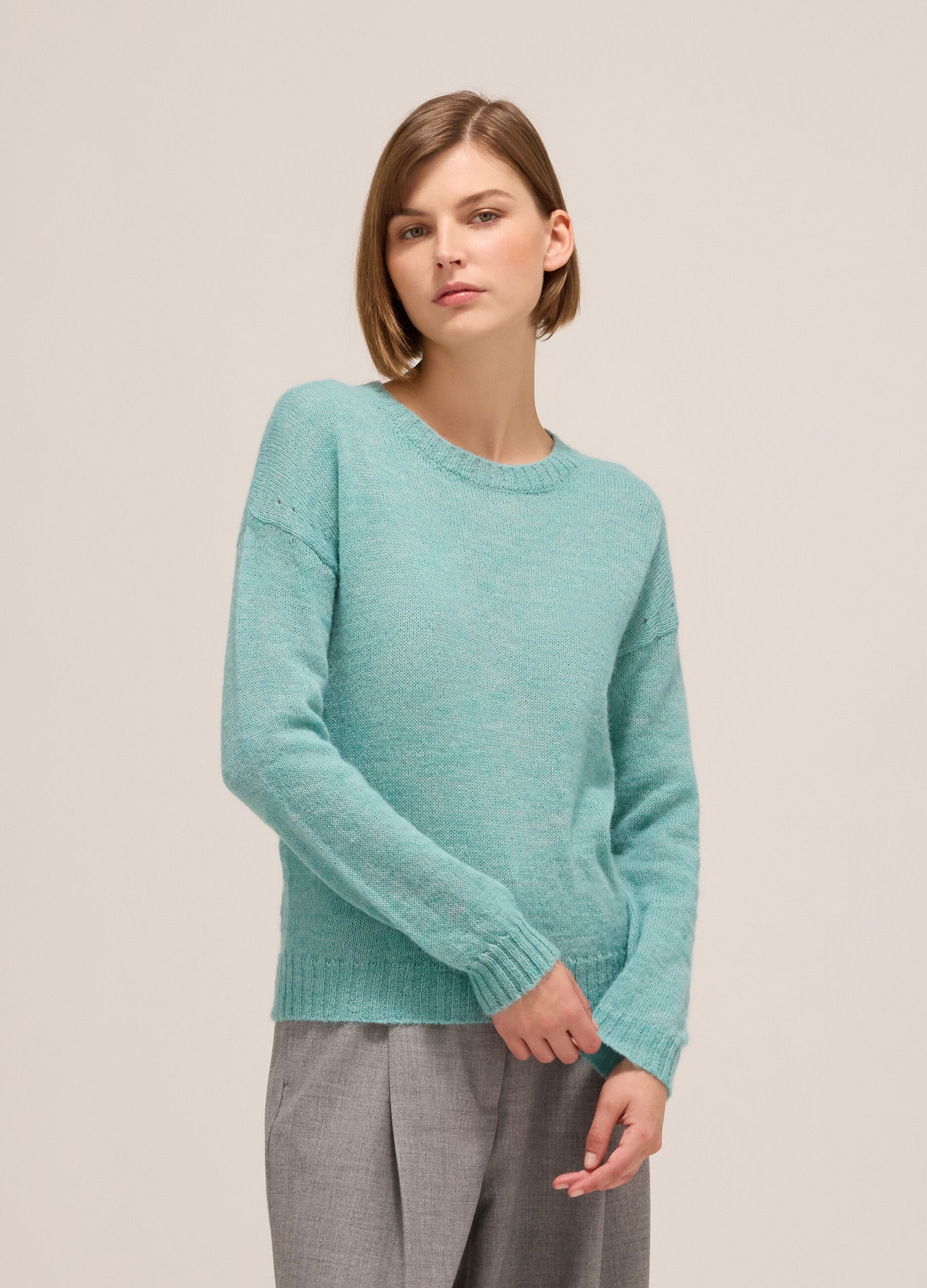 Knitted sweater with round neck