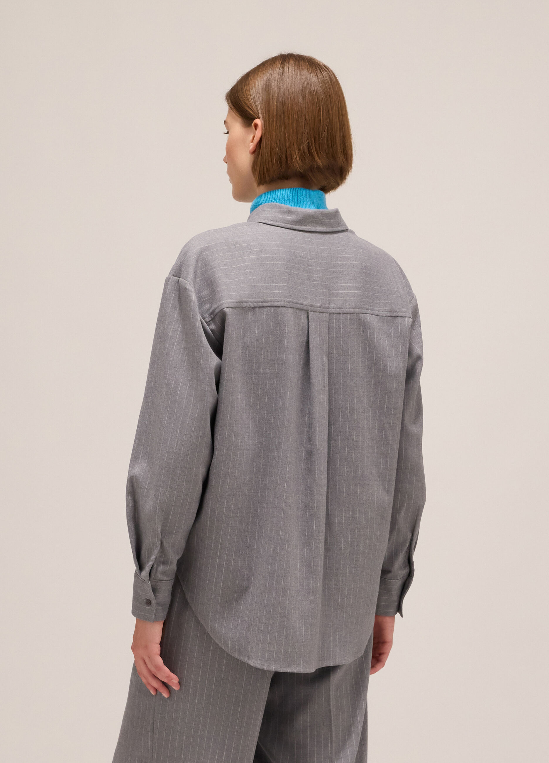 Pinstriped shirt with long sleeves