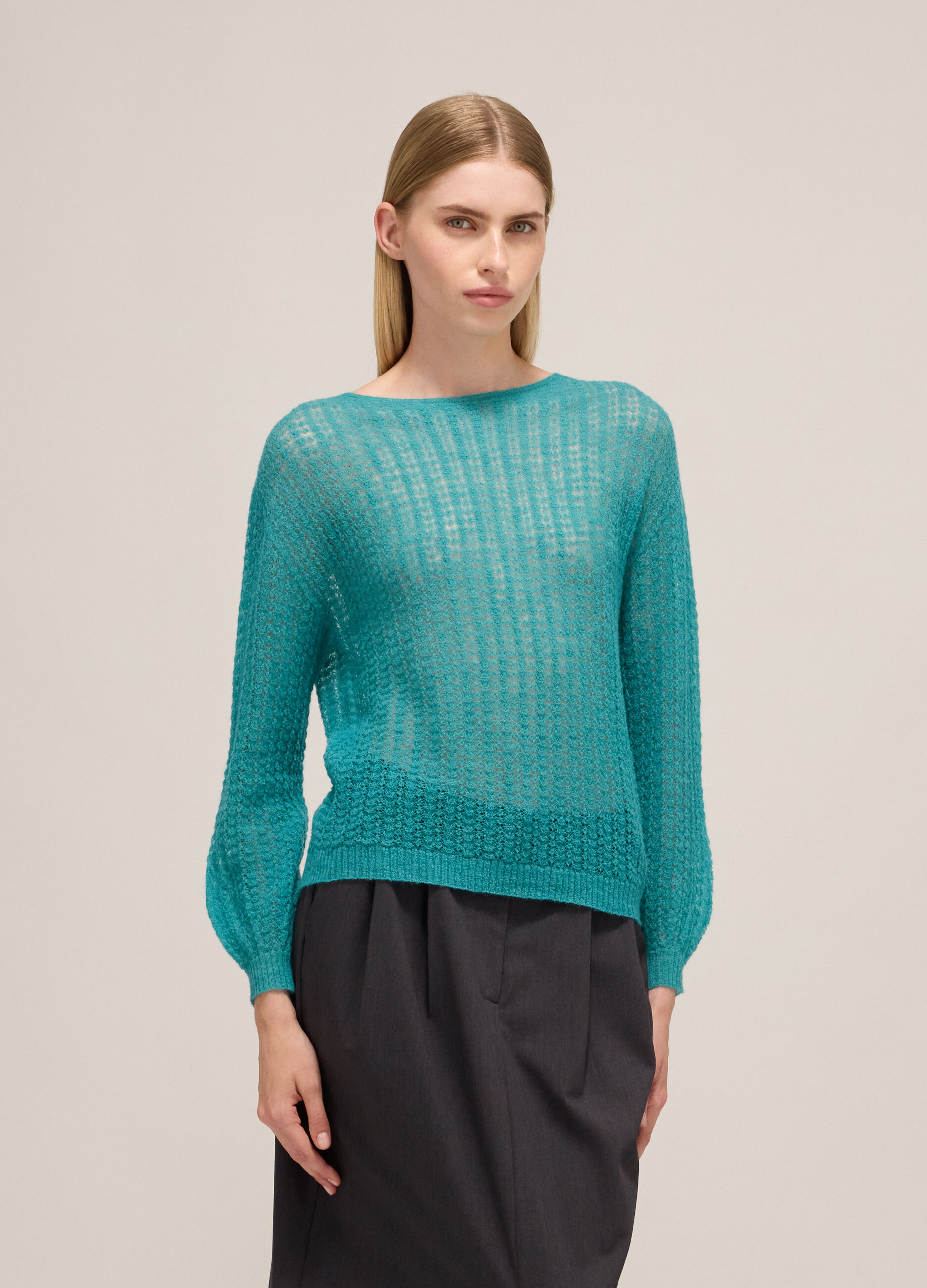 Knitted sweater with long sleeves