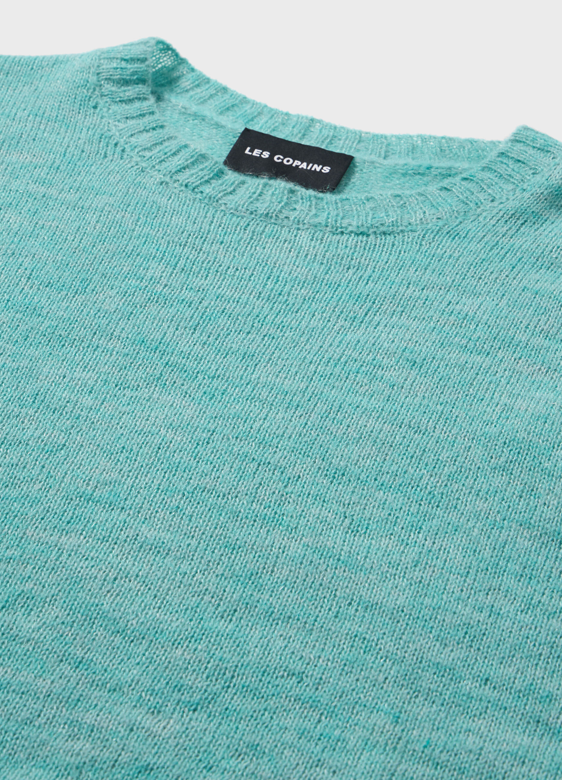 Knitted sweater with round neck