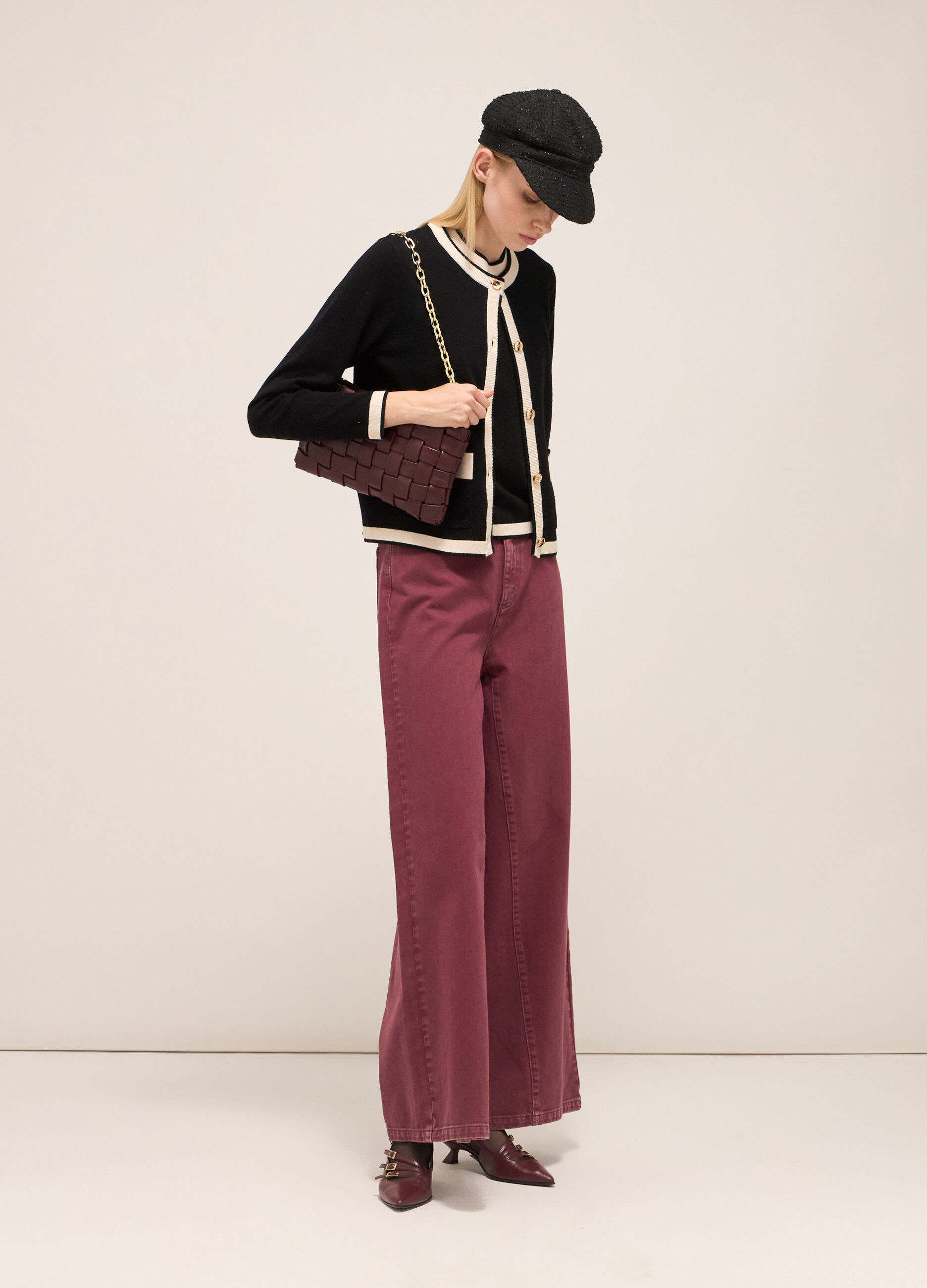 Knitted cardigan with contrasting coloured trims