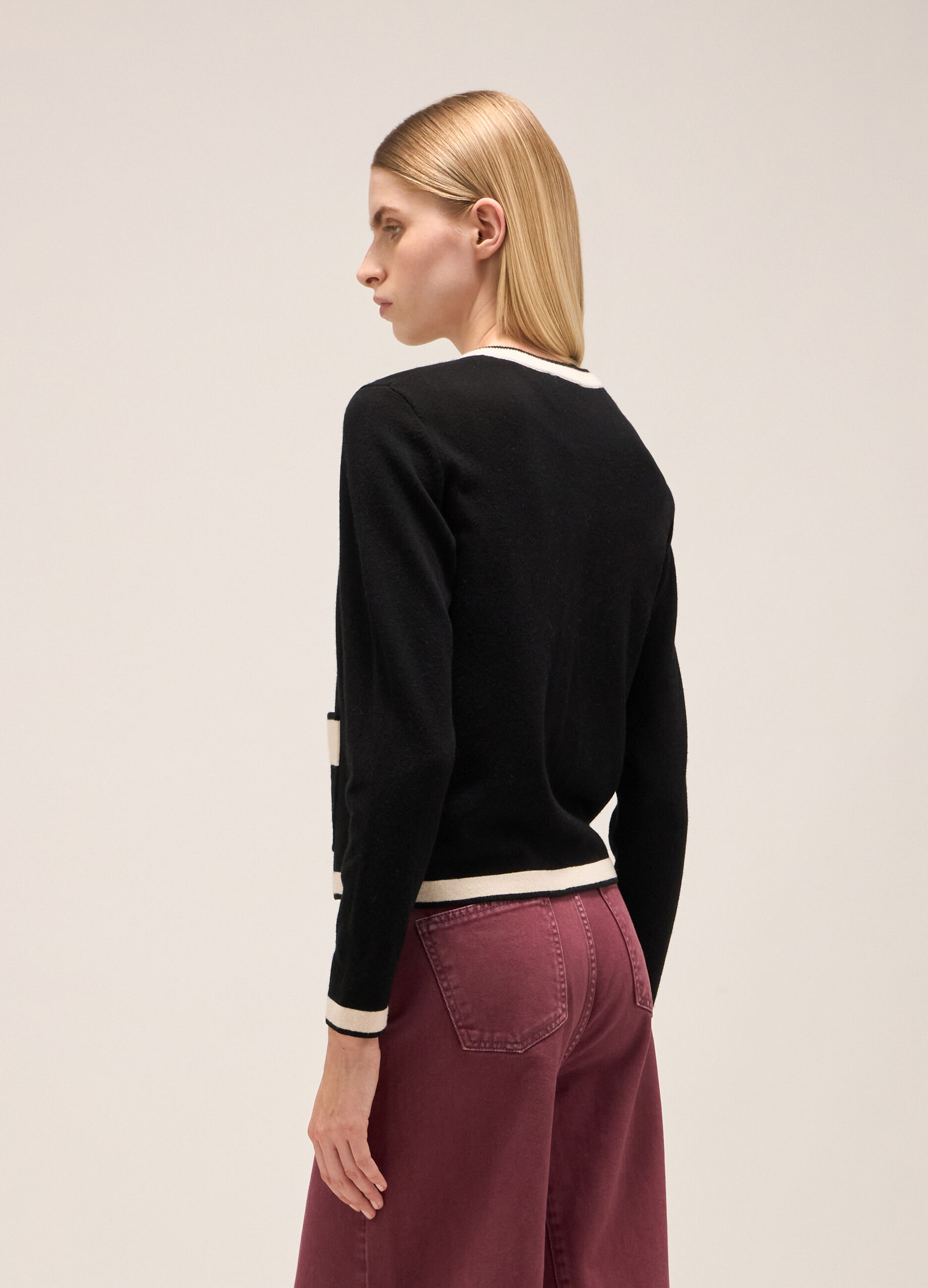 Knitted cardigan with contrasting coloured trims