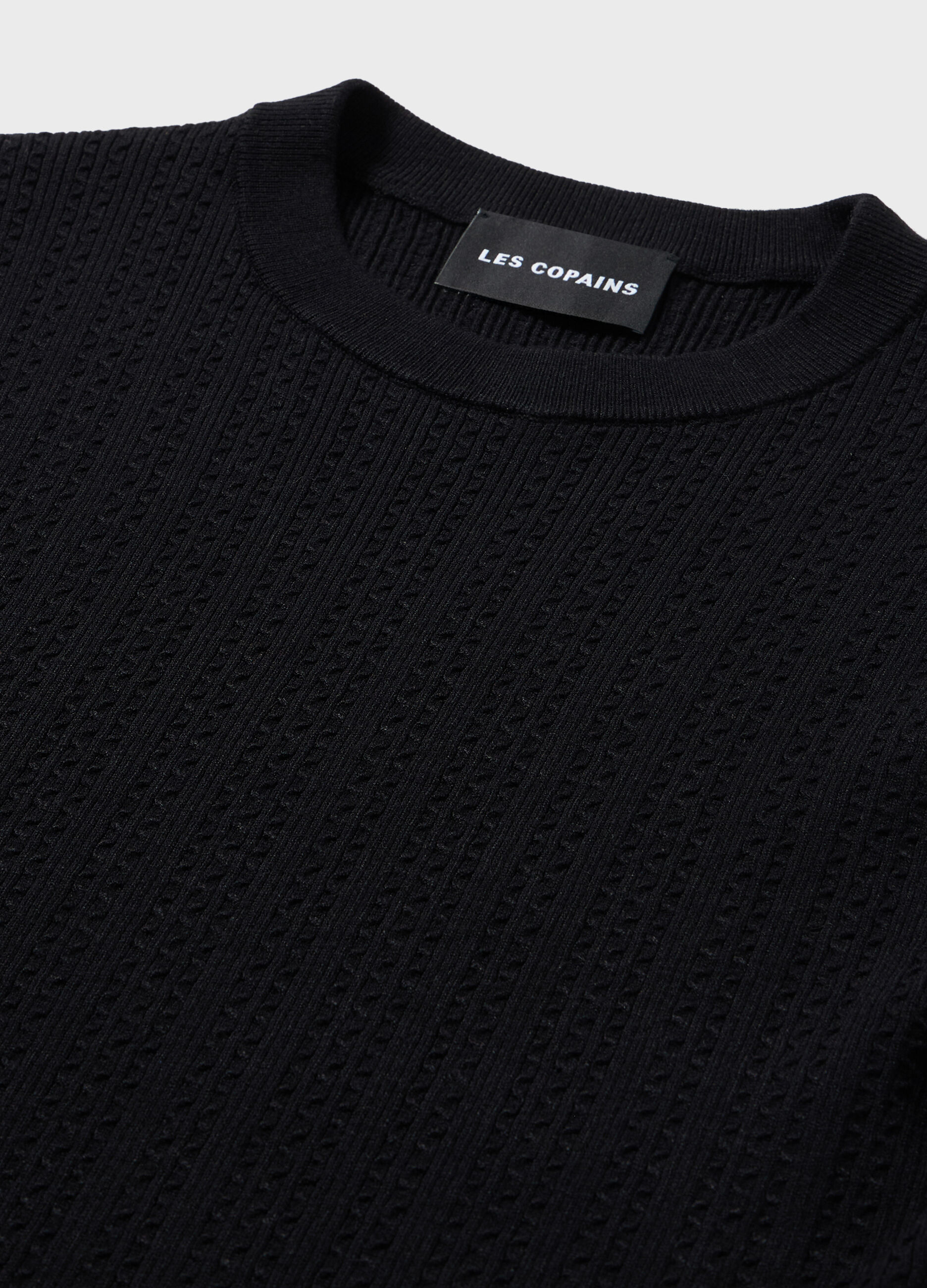 Knitted top with short sleeves