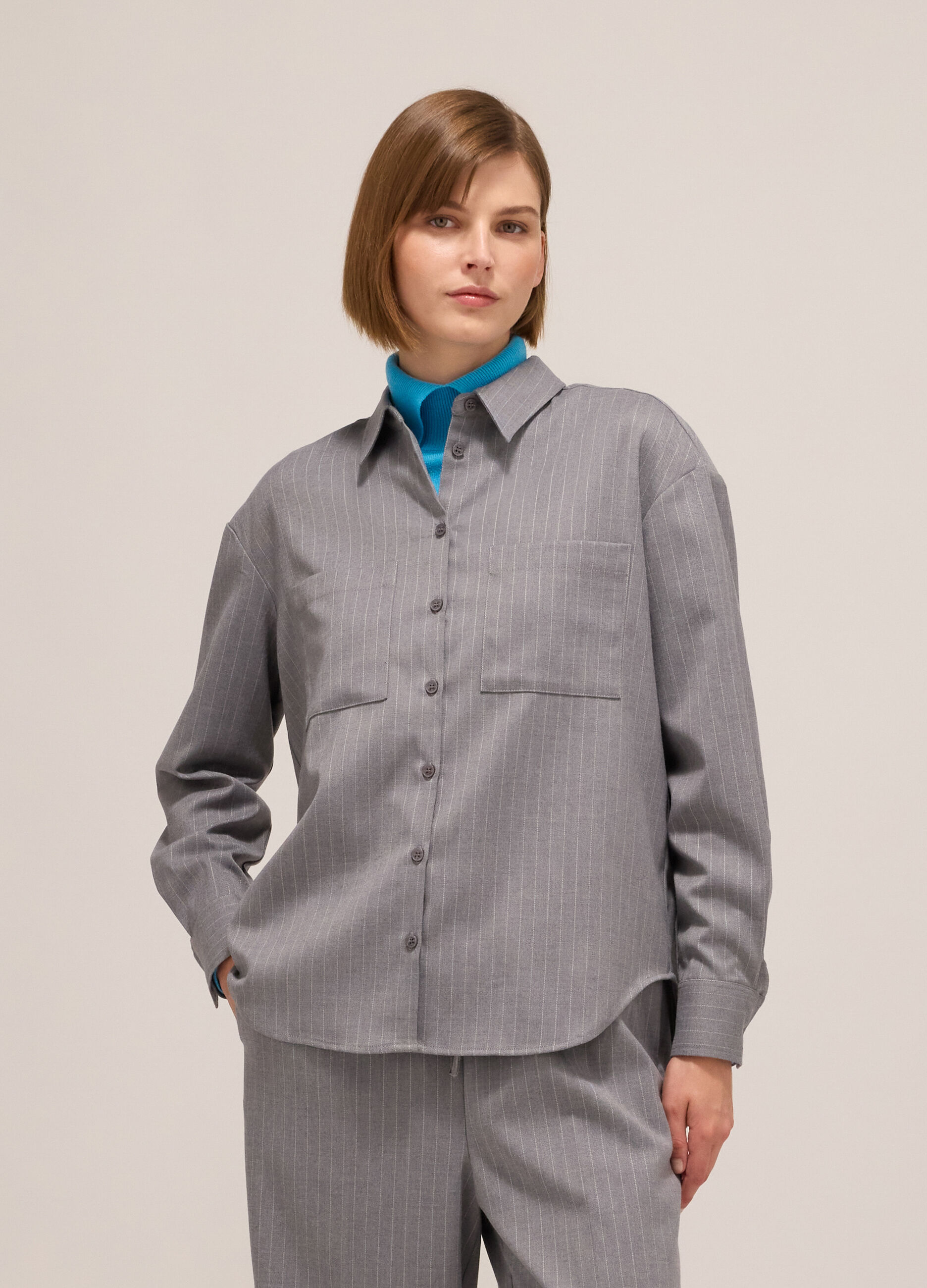 Pinstriped shirt with long sleeves