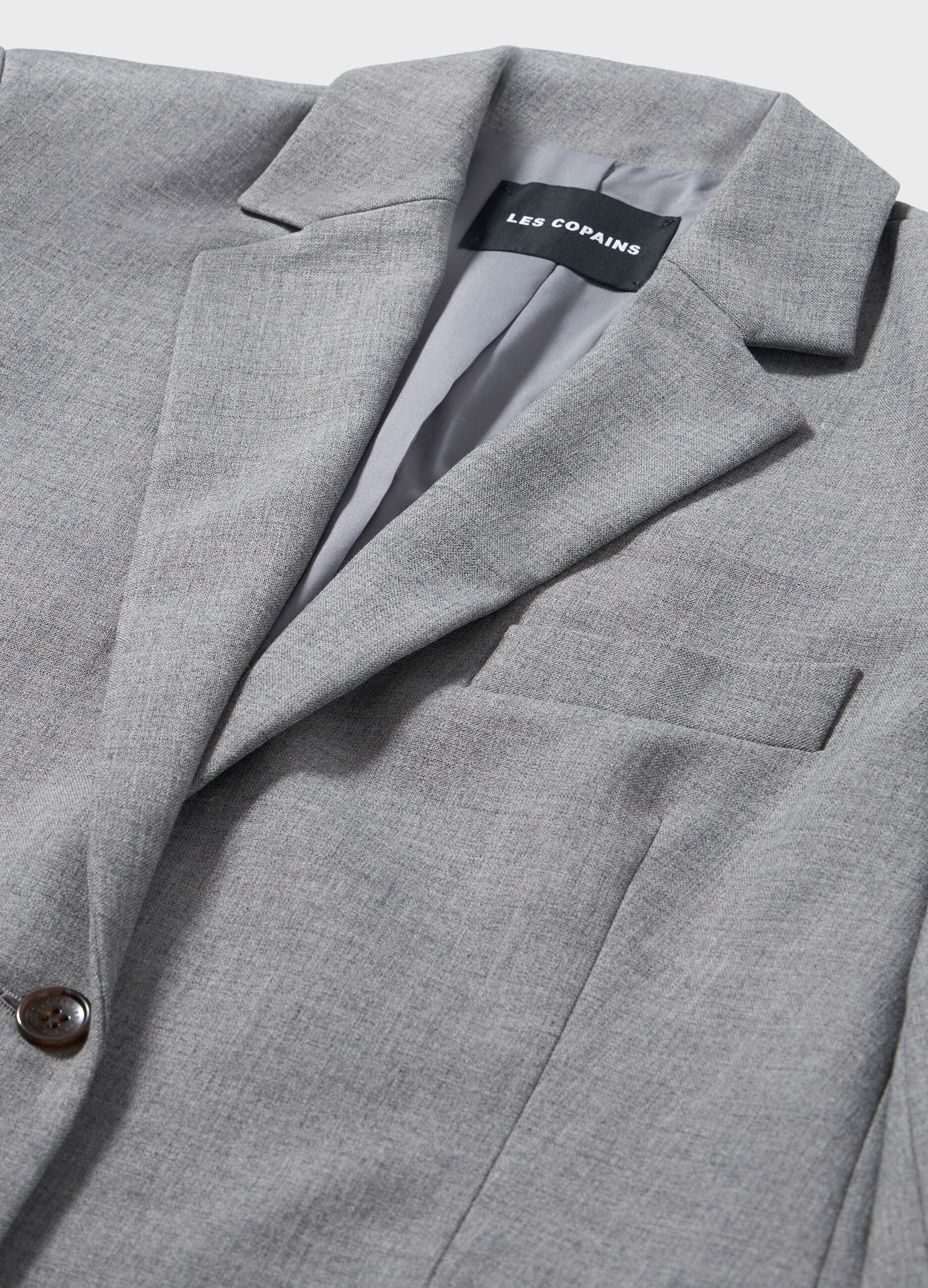 Blazer long fermé par deux boutons