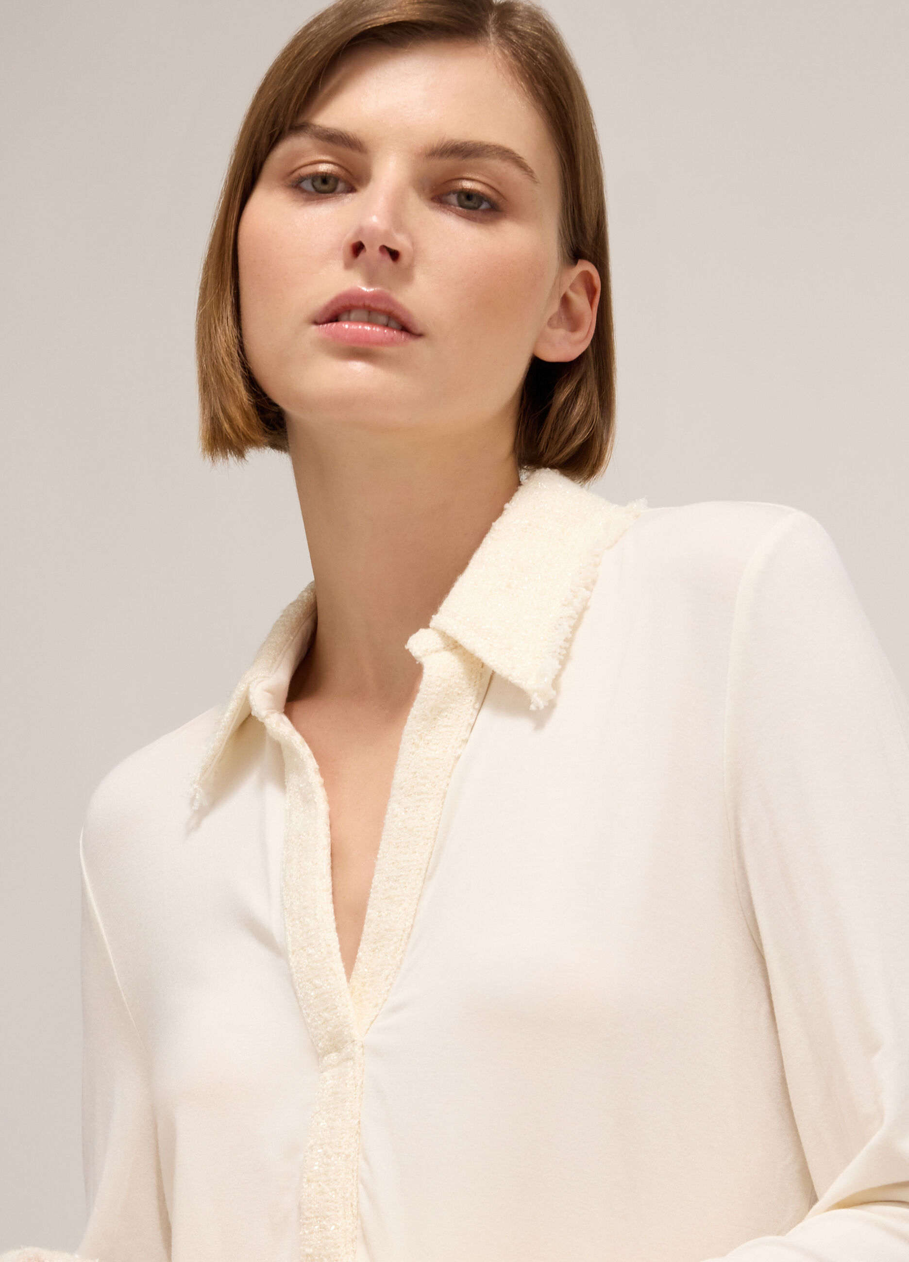 Polo shirt with long sleeves and bouclé inserts