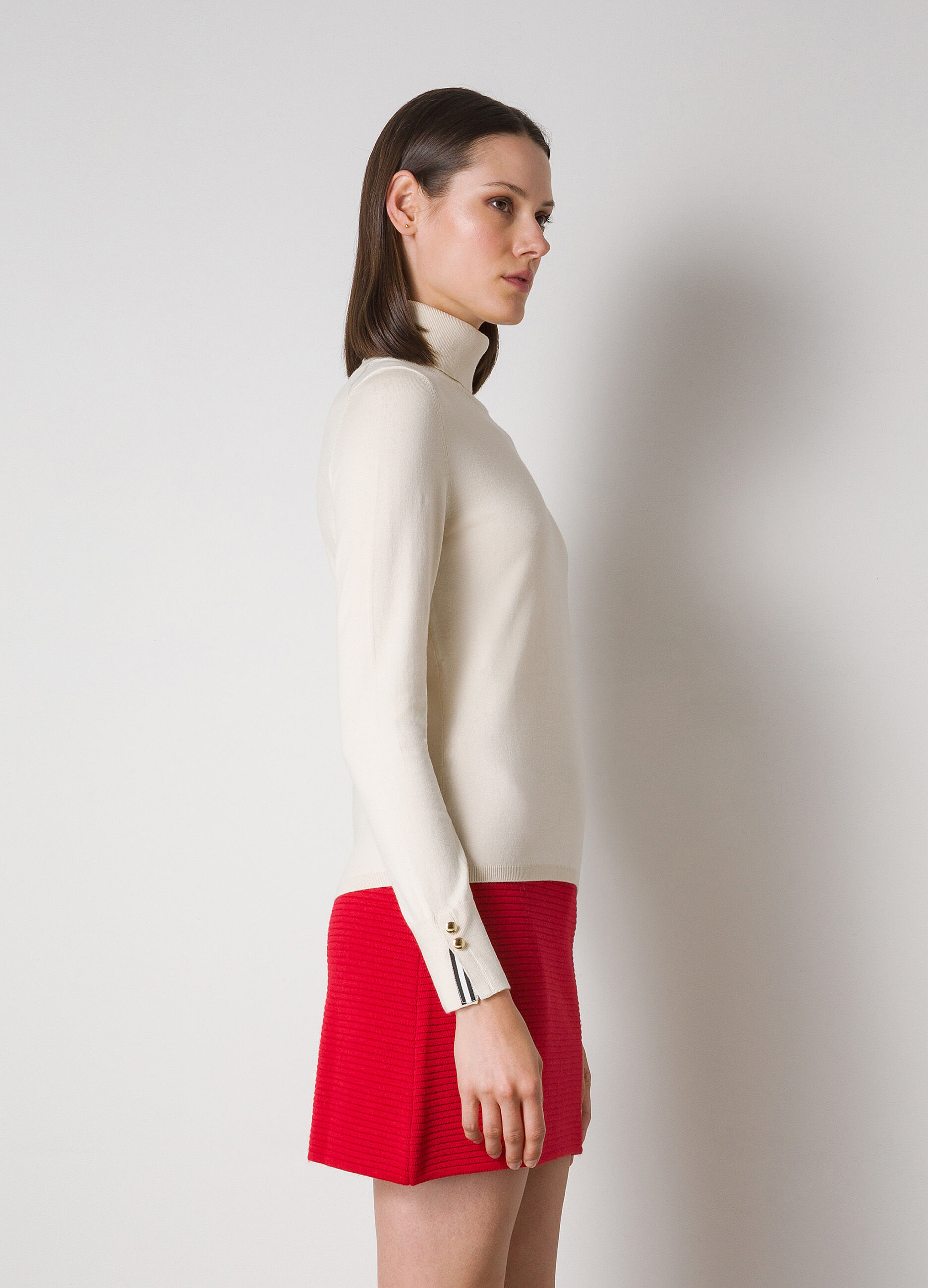 Tricot turtleneck with buttons