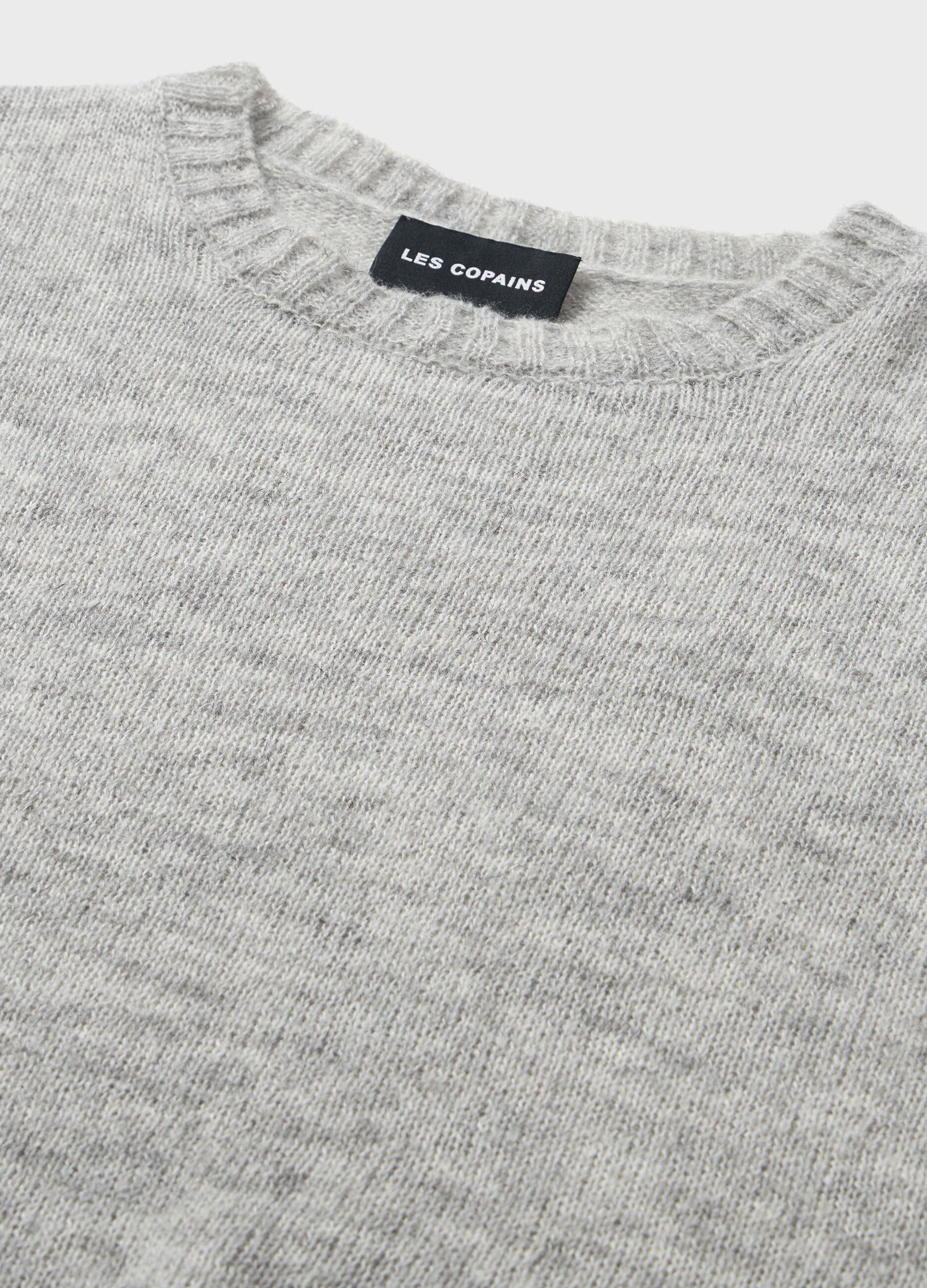 Knitted sweater with round neck
