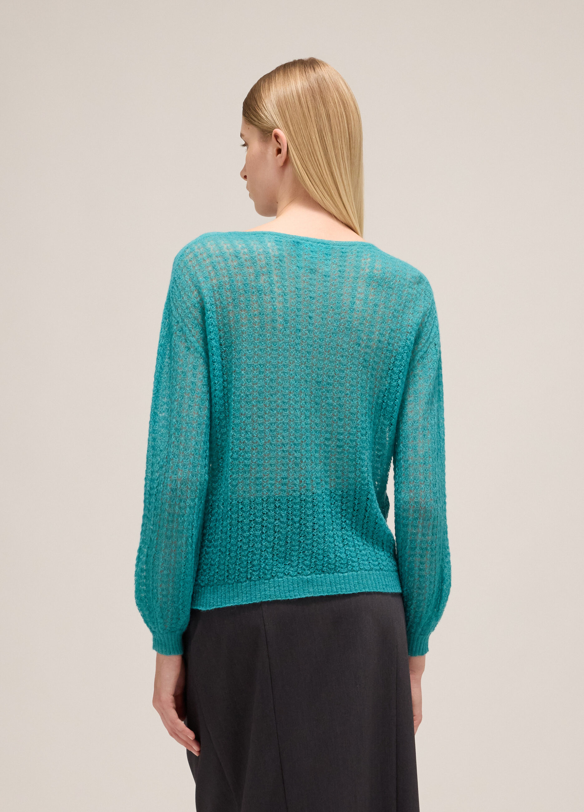 Knitted sweater with long sleeves