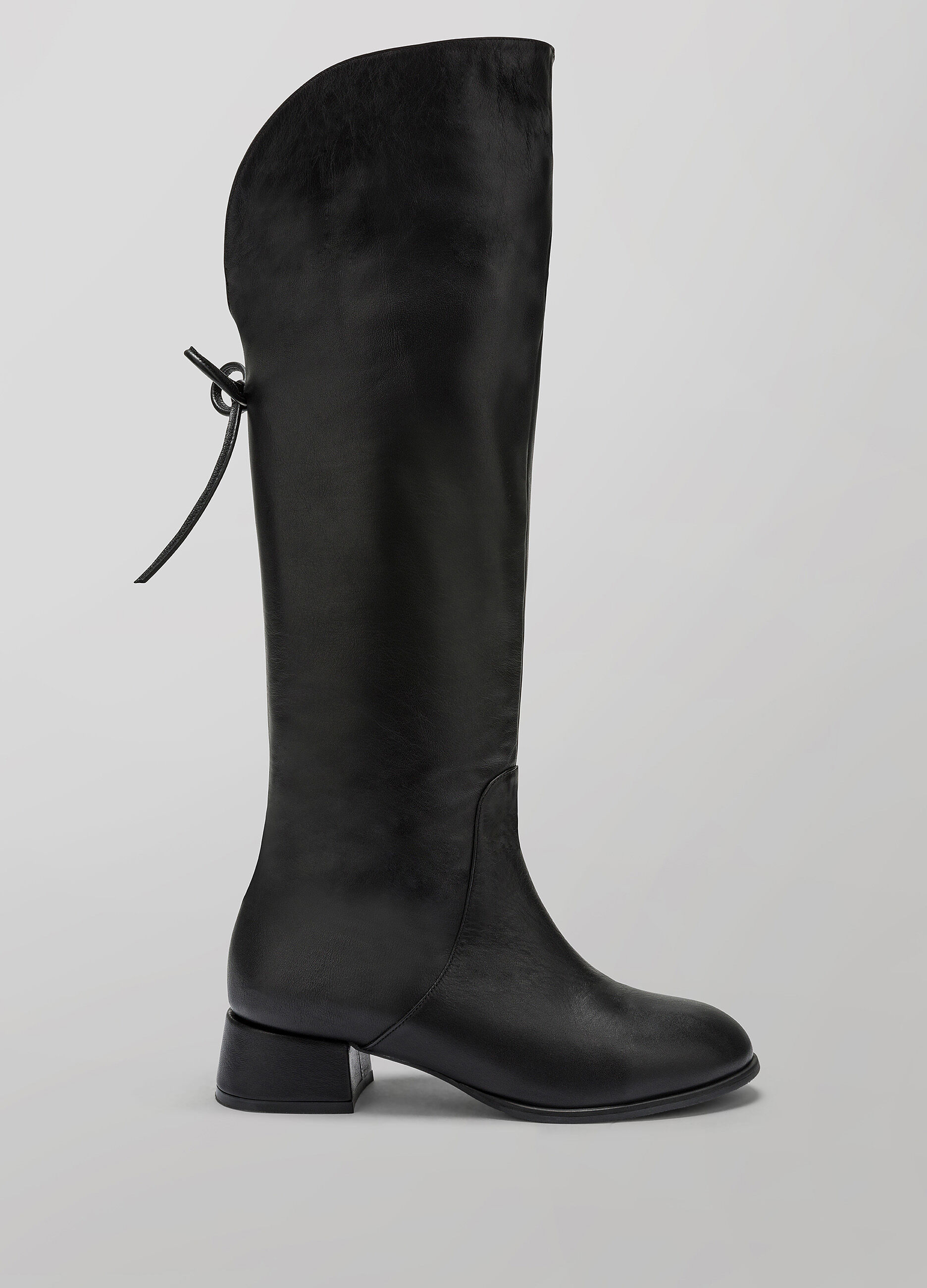 Black faux leather knee-high boot