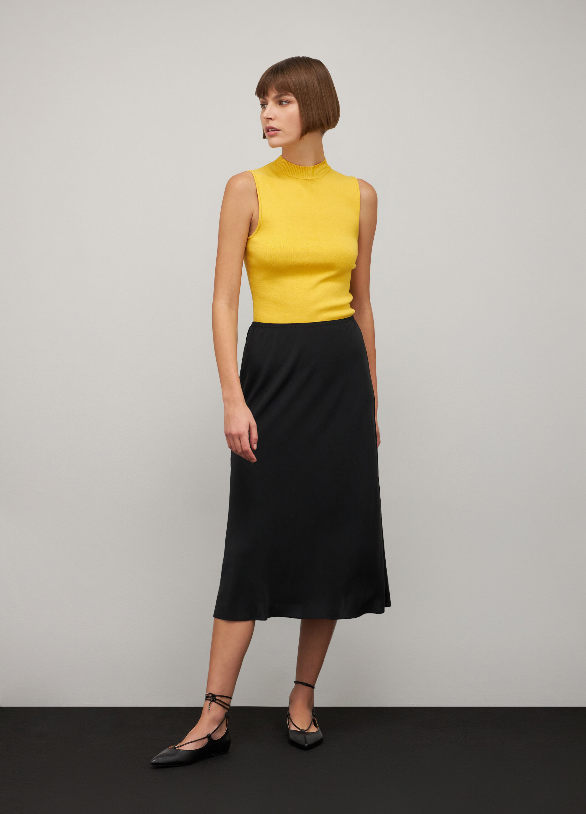 Yellow viscose blend high neck tricot top_0