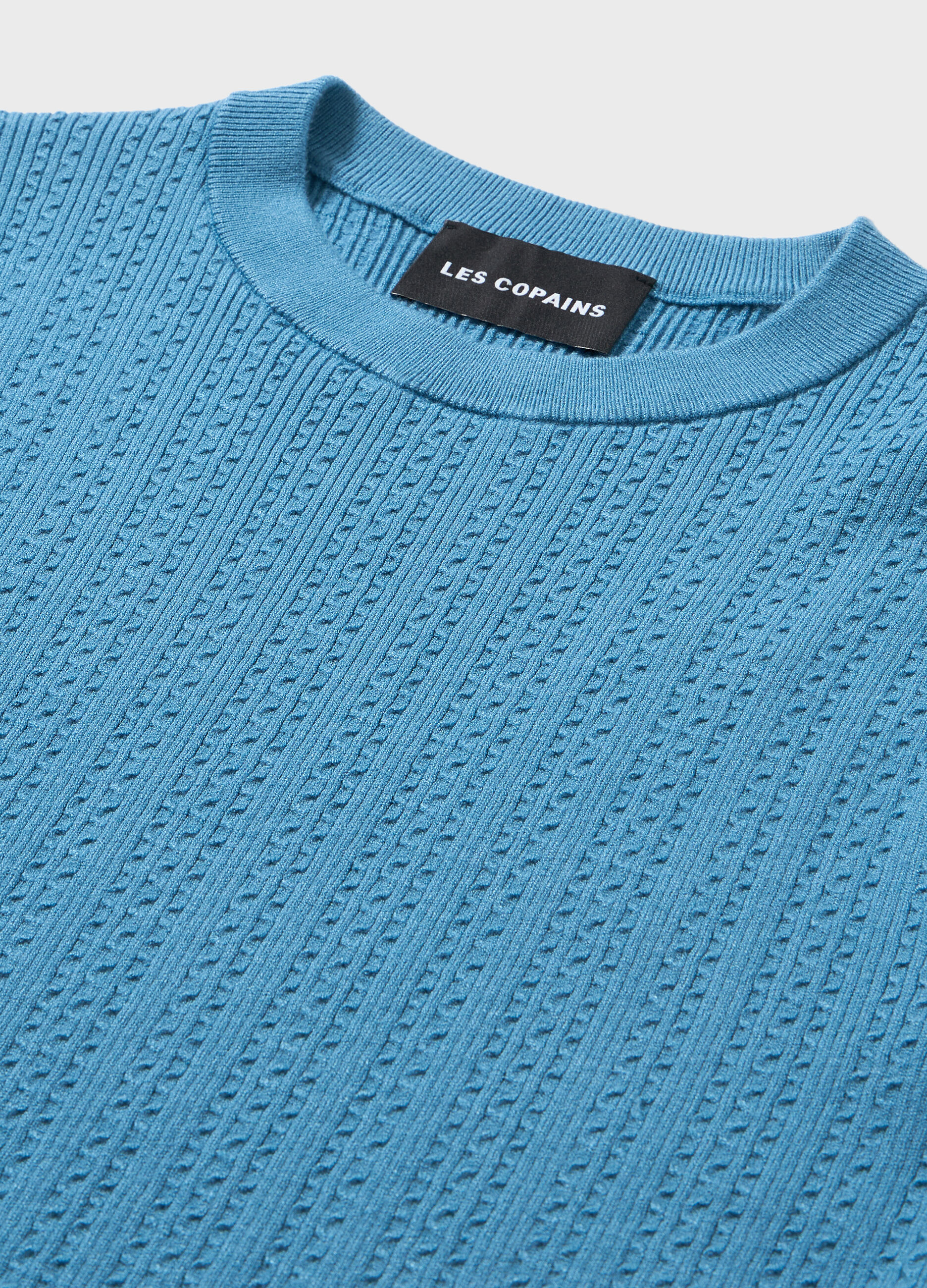Knitted top with short sleeves
