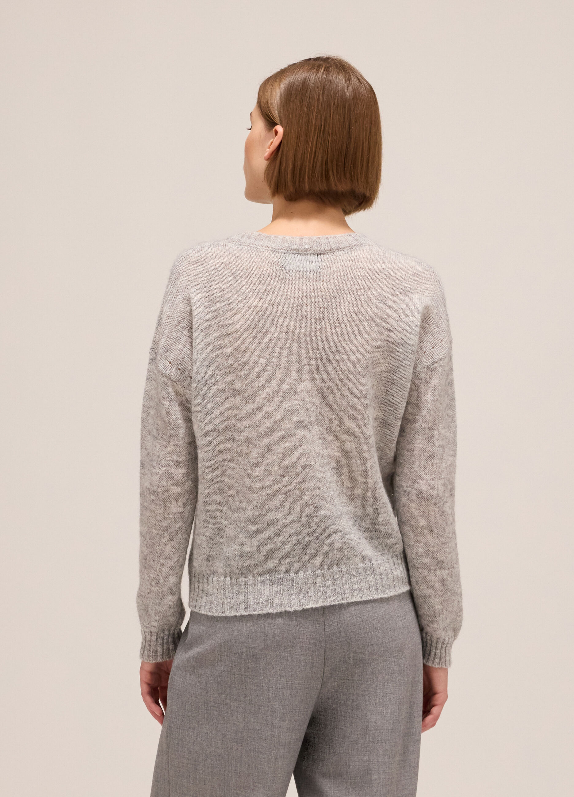 Knitted sweater with round neck