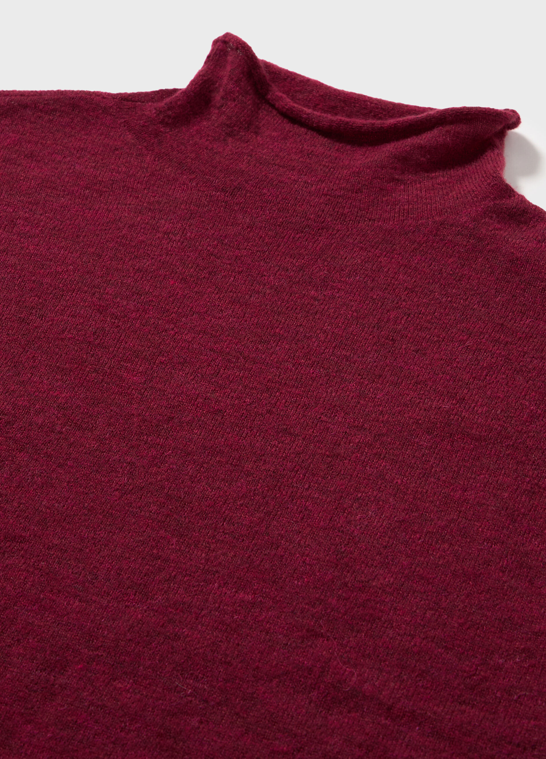 Knitted sweater with high neck