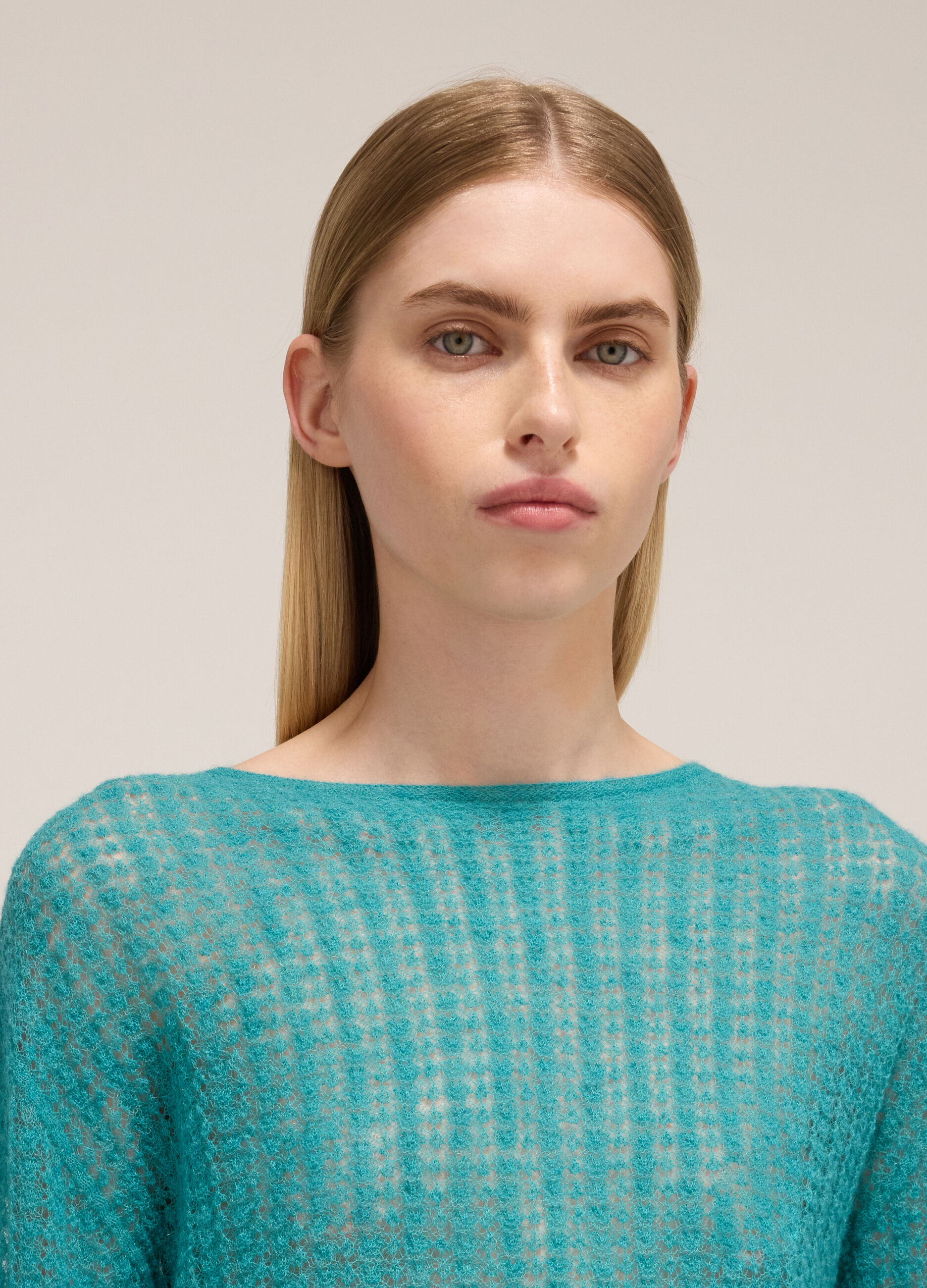 Knitted sweater with long sleeves