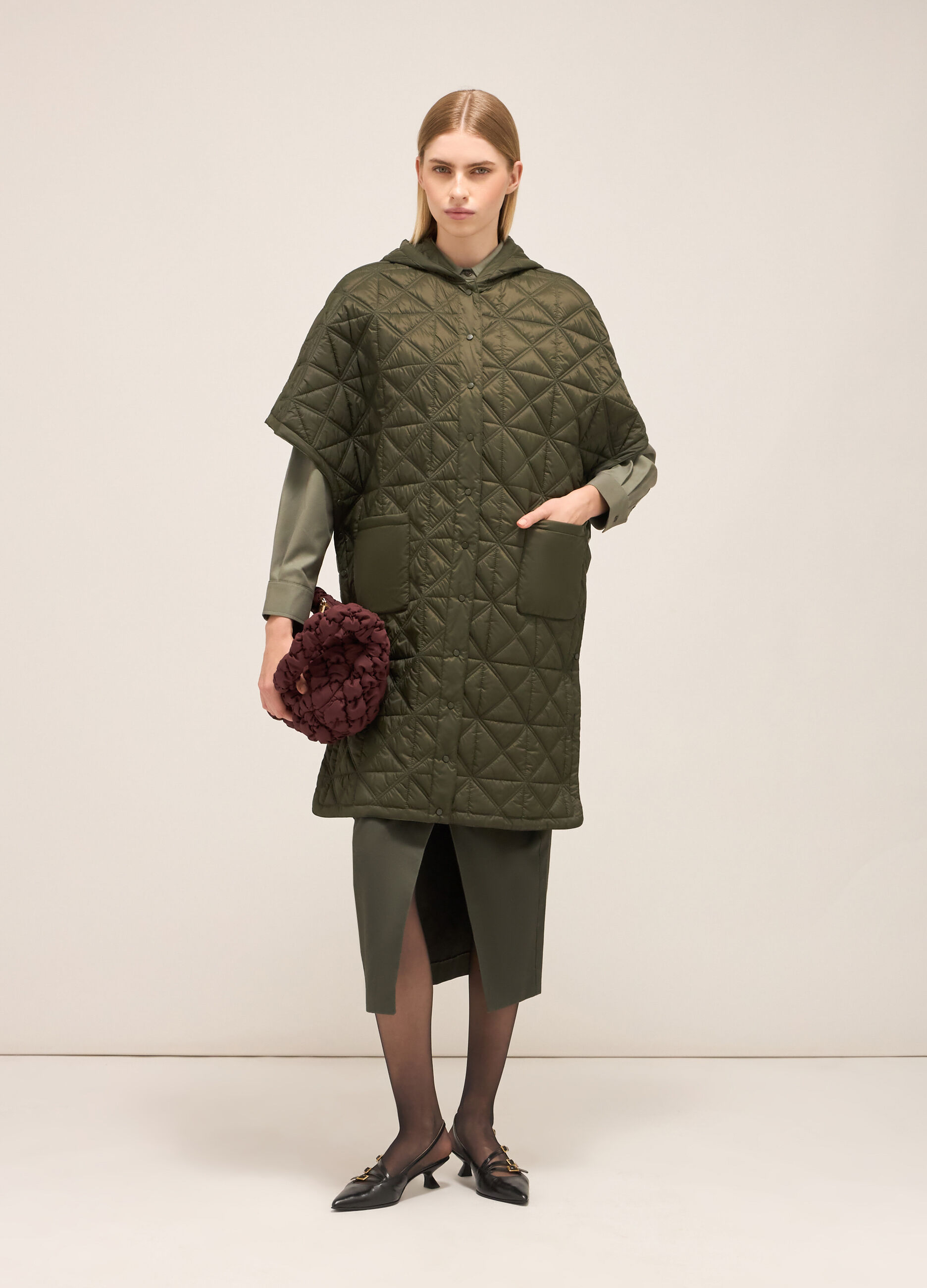 Quilted cape with hood