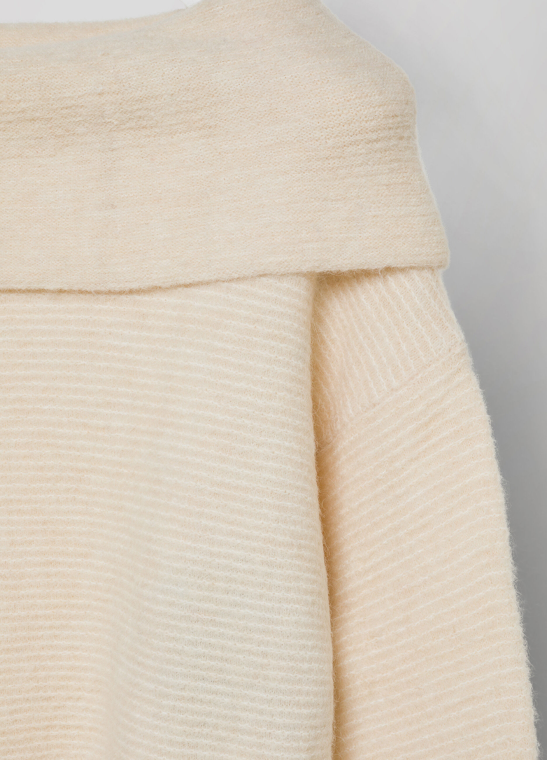 White cream off the shoulder wool and alpaca blend tricot top 