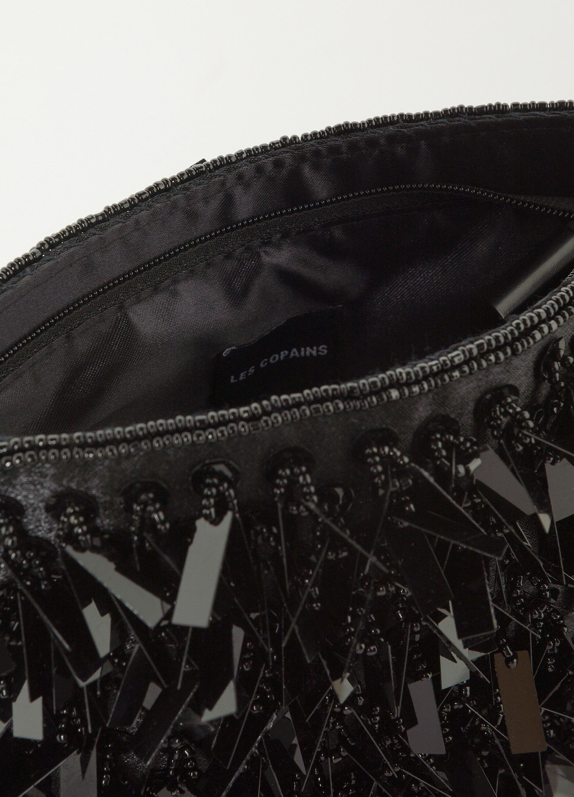 Black shoulder bag with appliqués_2