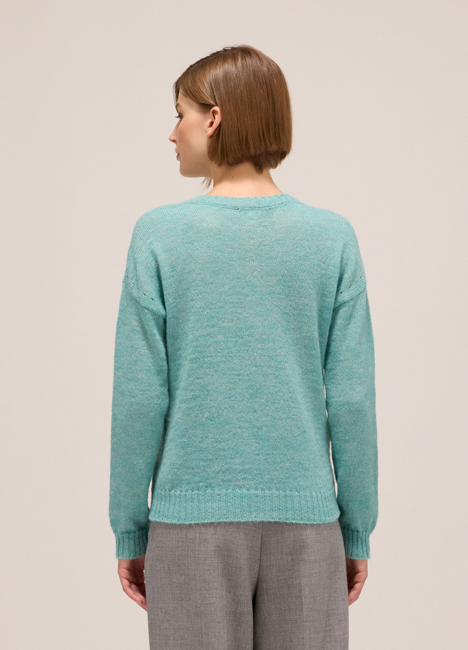 Knitted sweater with round neck